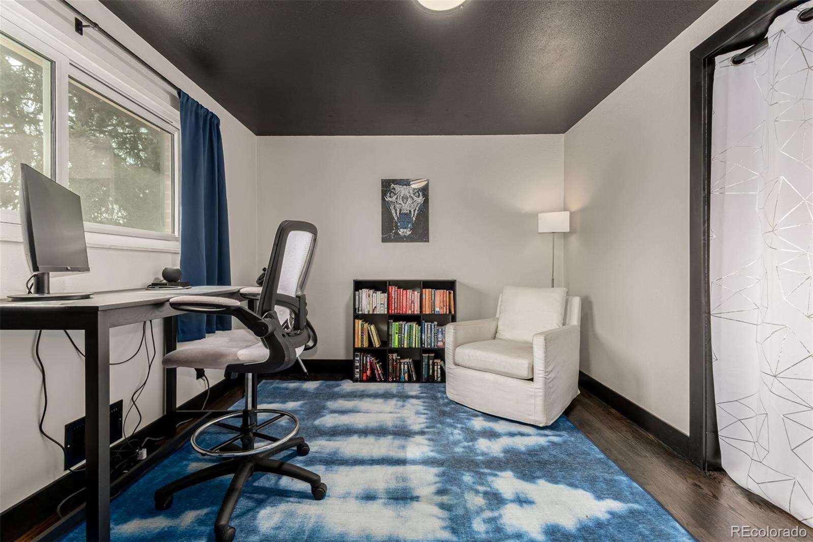 11875 Spring Drive Northglenn, CO 80233 - Photo 24 of 29 a view of living room with furniture and a floor to ceiling window