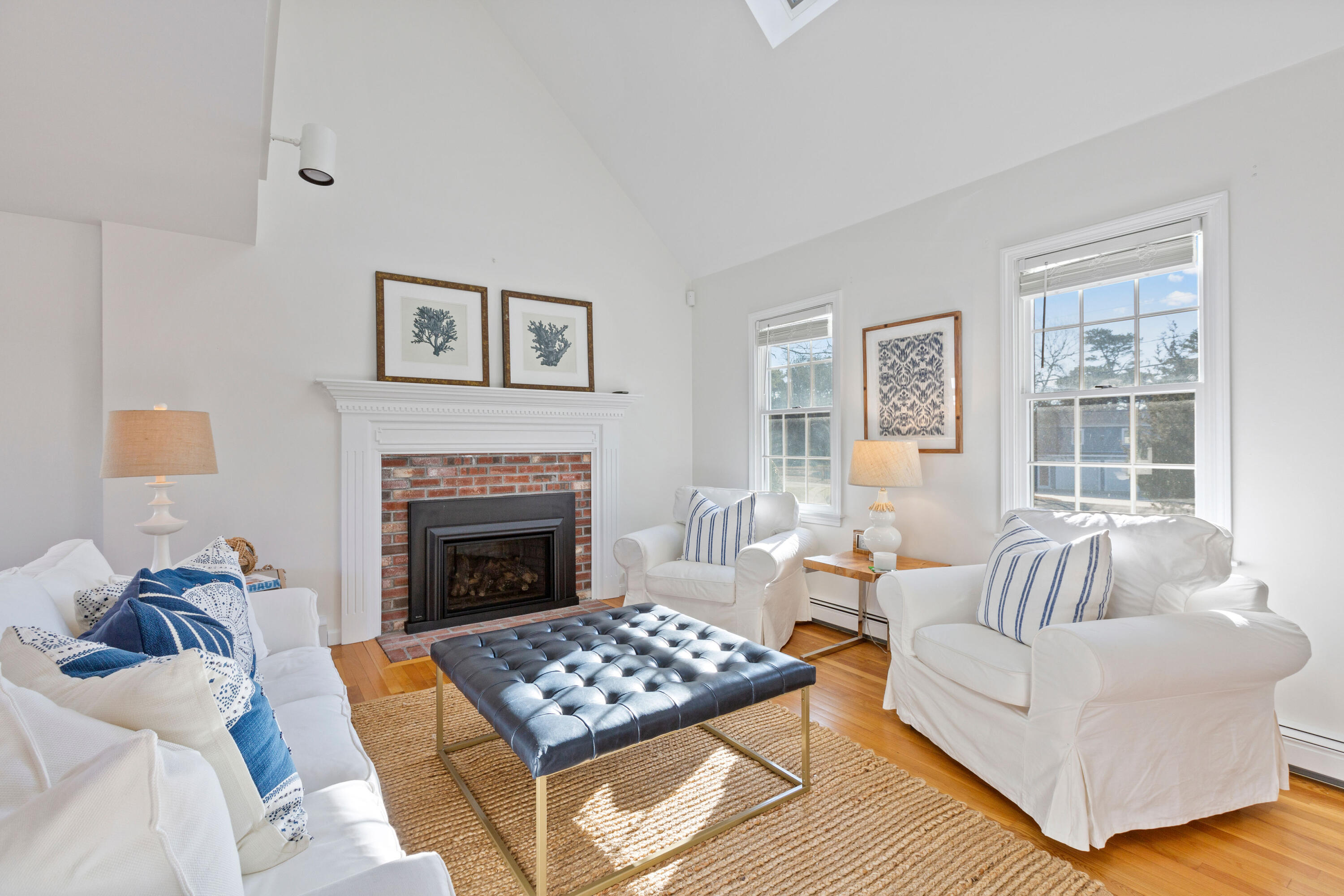 220 Hay Road Eastham, MA 02642 - Photo 18 of 54 a living room with furniture and a fireplace