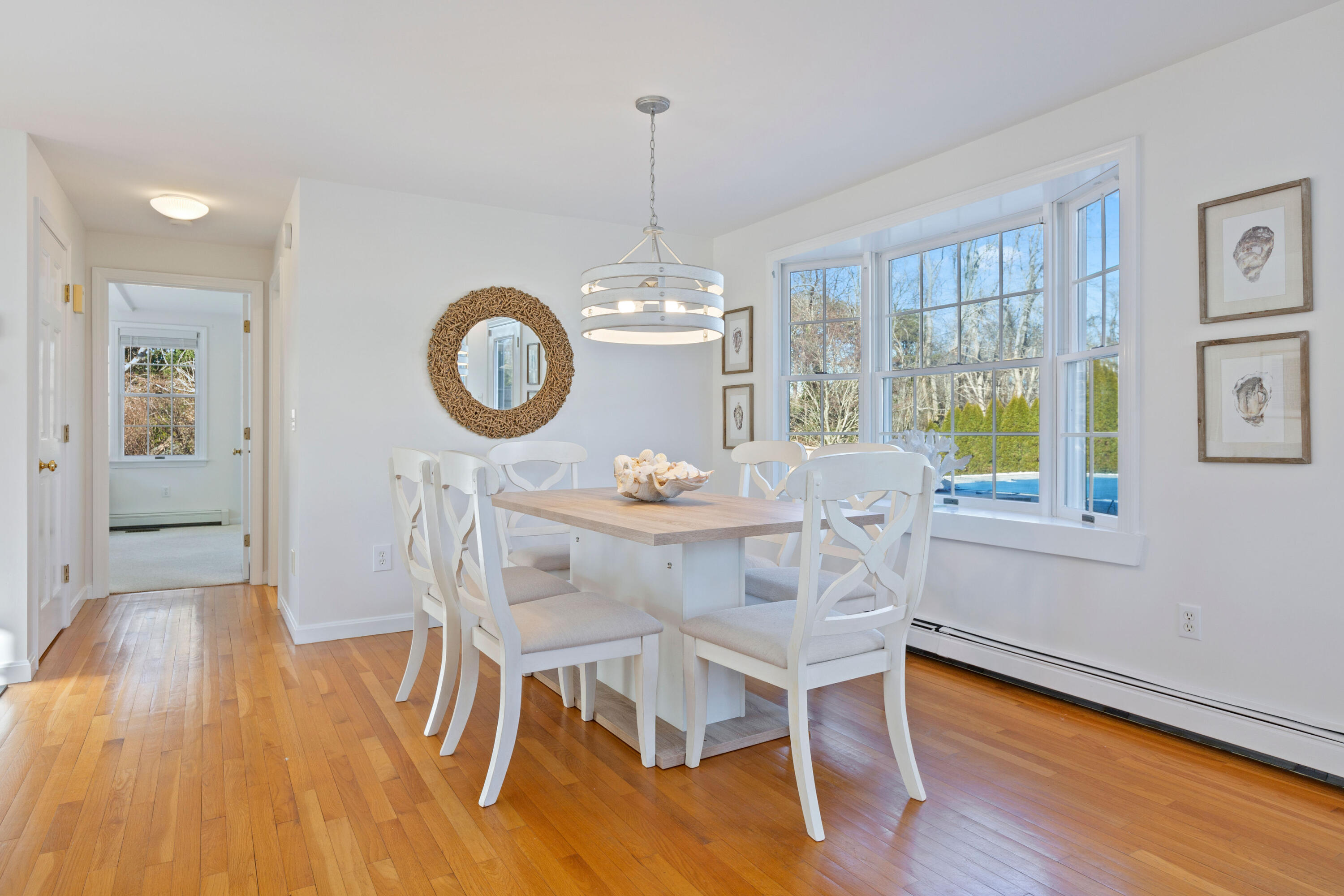 220 Hay Road Eastham, MA 02642 - Photo 21 of 54 a view of a dining room with furniture window and wooden floor