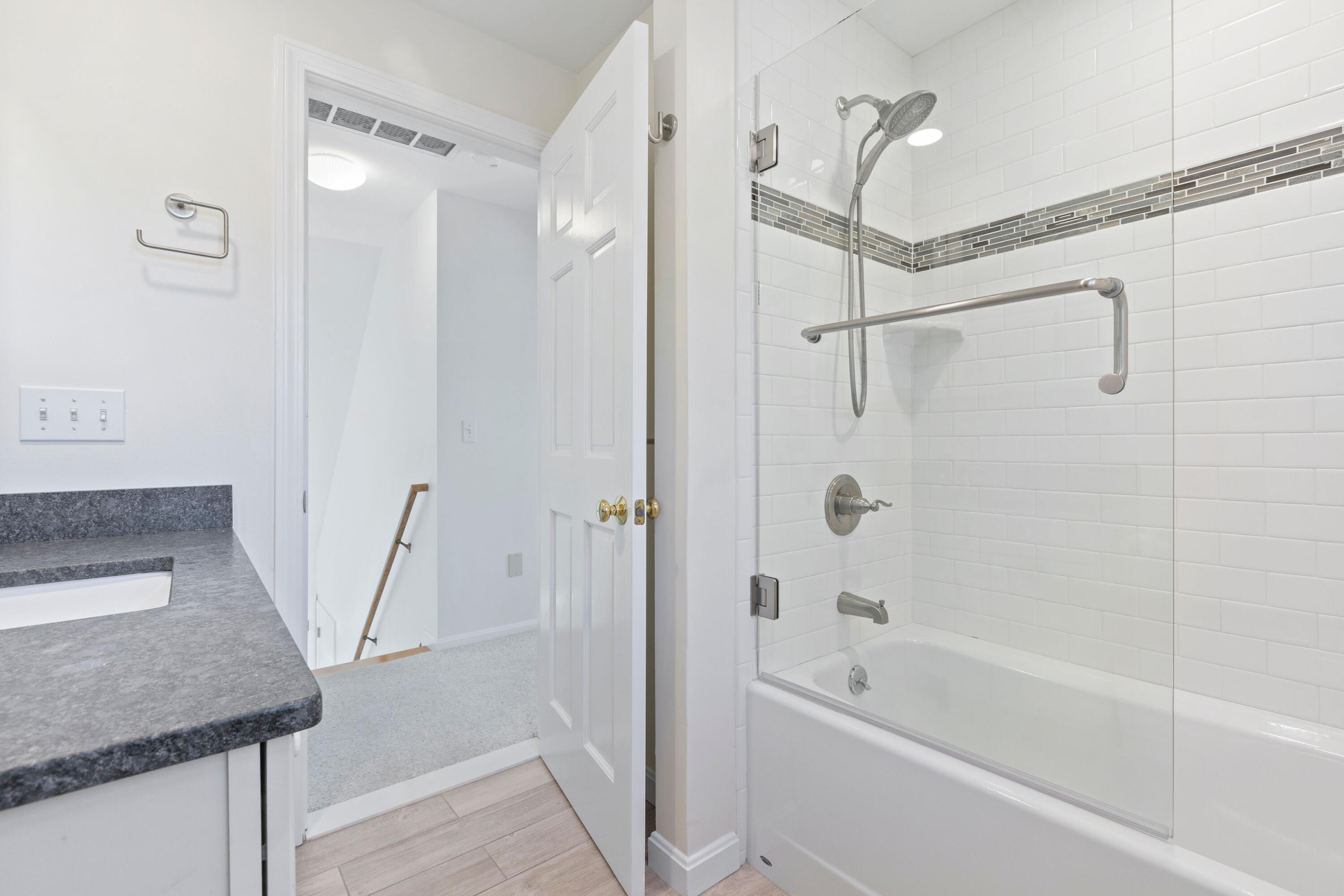 220 Hay Road Eastham, MA 02642 - Photo 30 of 54 a bathroom with a tub a sink a vanity and a shower