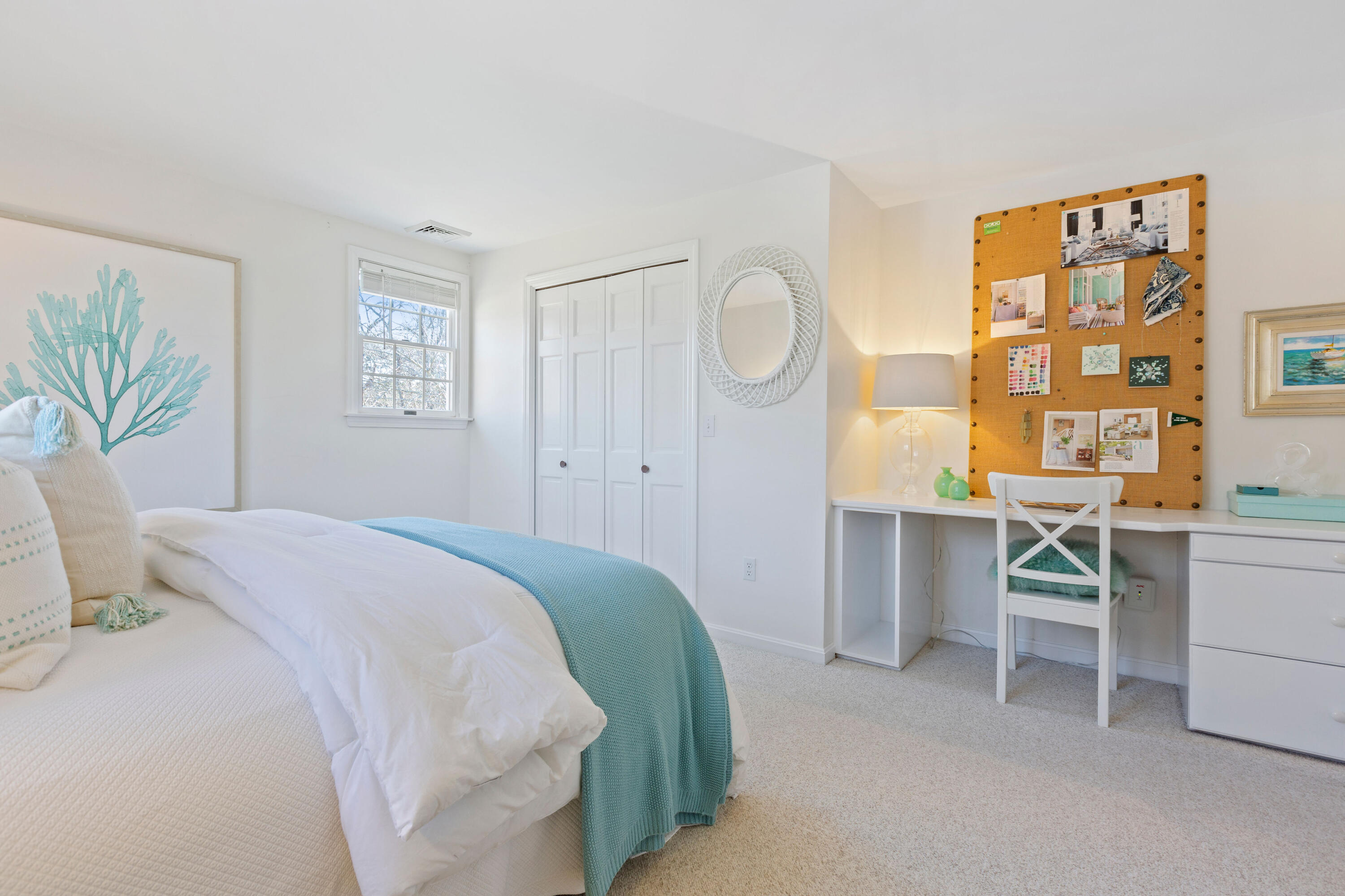 220 Hay Road Eastham, MA 02642 - Photo 33 of 54 a bedroom with a bed and a table