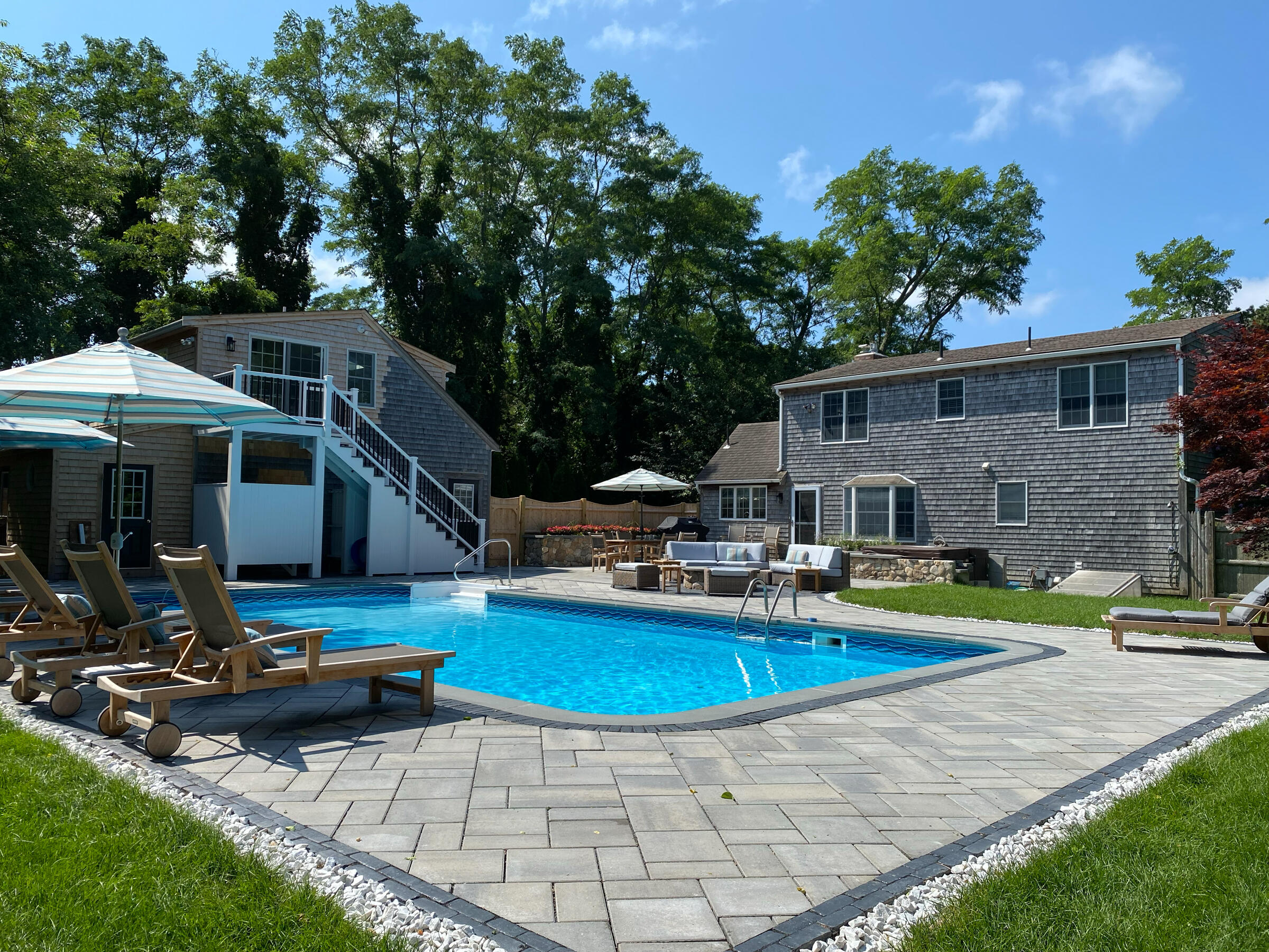 220 Hay Road Eastham, MA 02642 - Photo 38 of 54 a front view of house with yard and outdoor seating