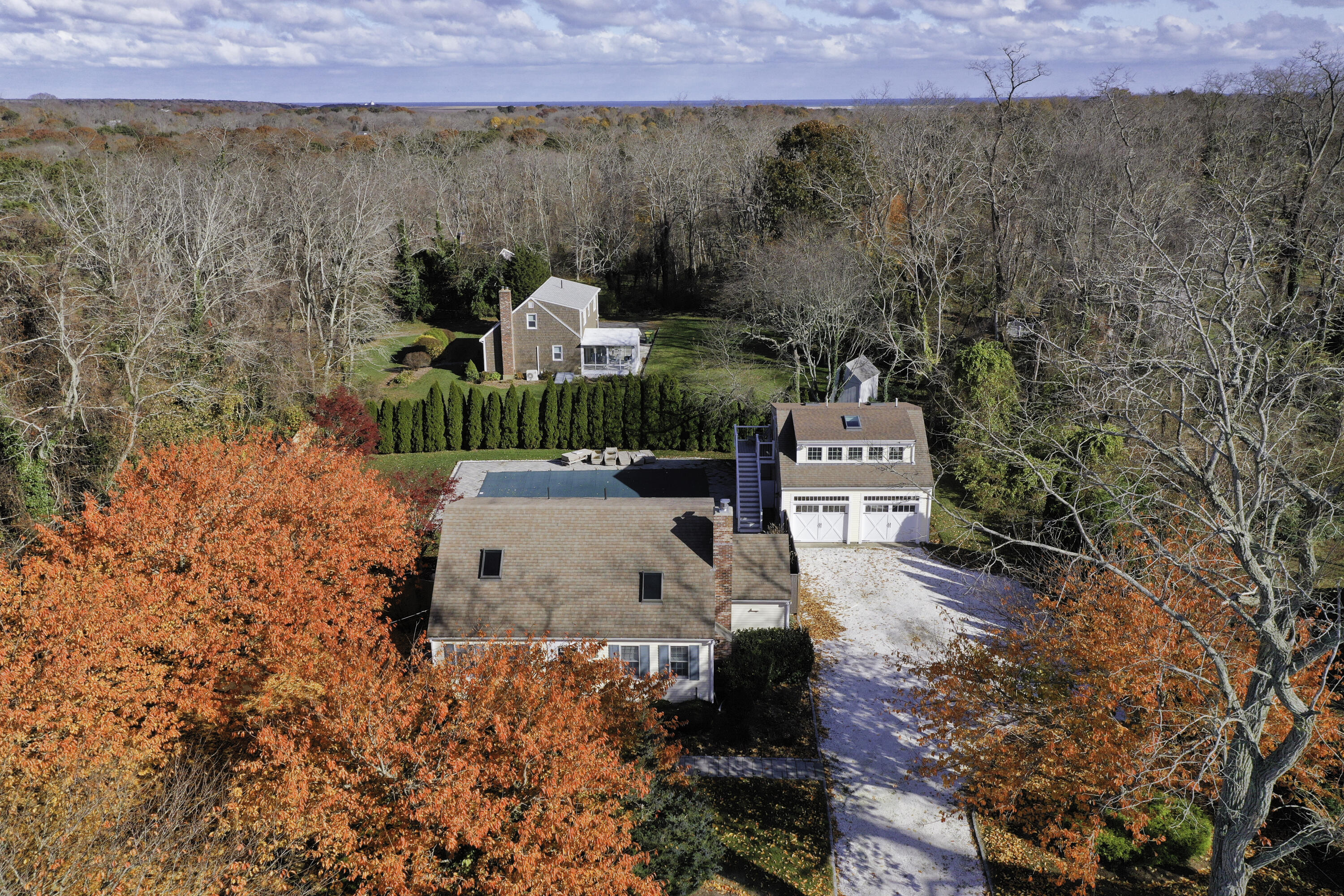 220 Hay Road Eastham, MA 02642 - Photo 4 of 54 an aerial view of a house with a yard