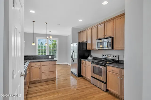 $420,000 | 417 Meadowland Circle, Maple Hill, NC 28454