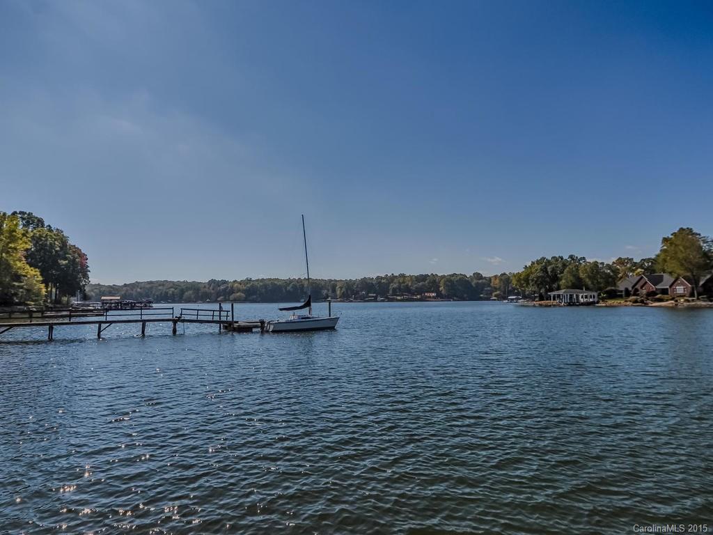 275 Whippoorwill Road Mooresville, NC 28117 - Photo 2 of 24 a view of ocean with boats and trees in the background