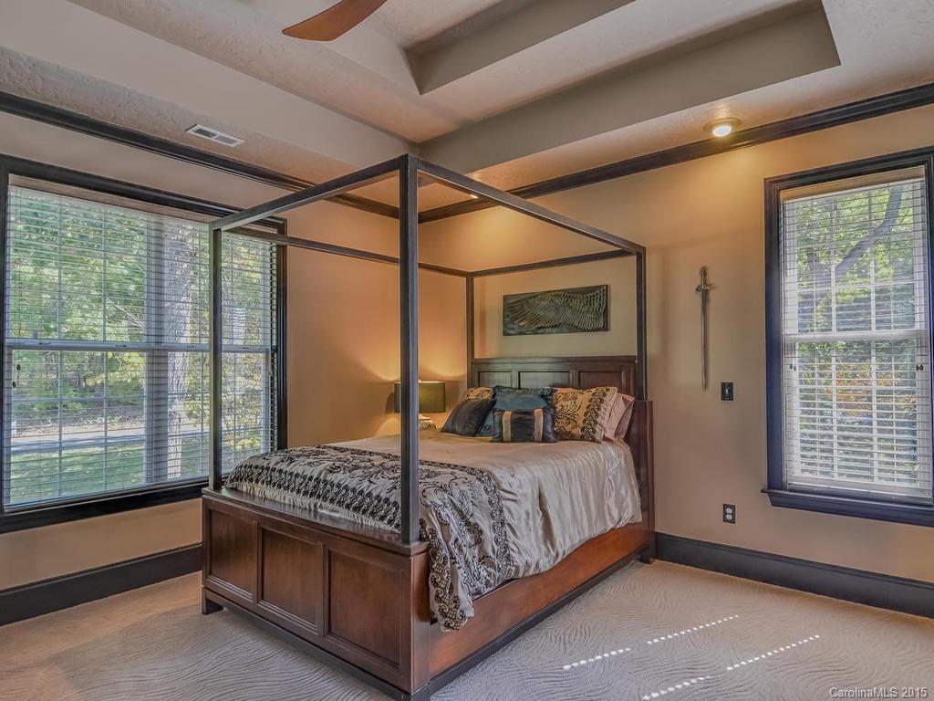 275 Whippoorwill Road Mooresville, NC 28117 - Photo 18 of 24 a bedroom with a bed and a window