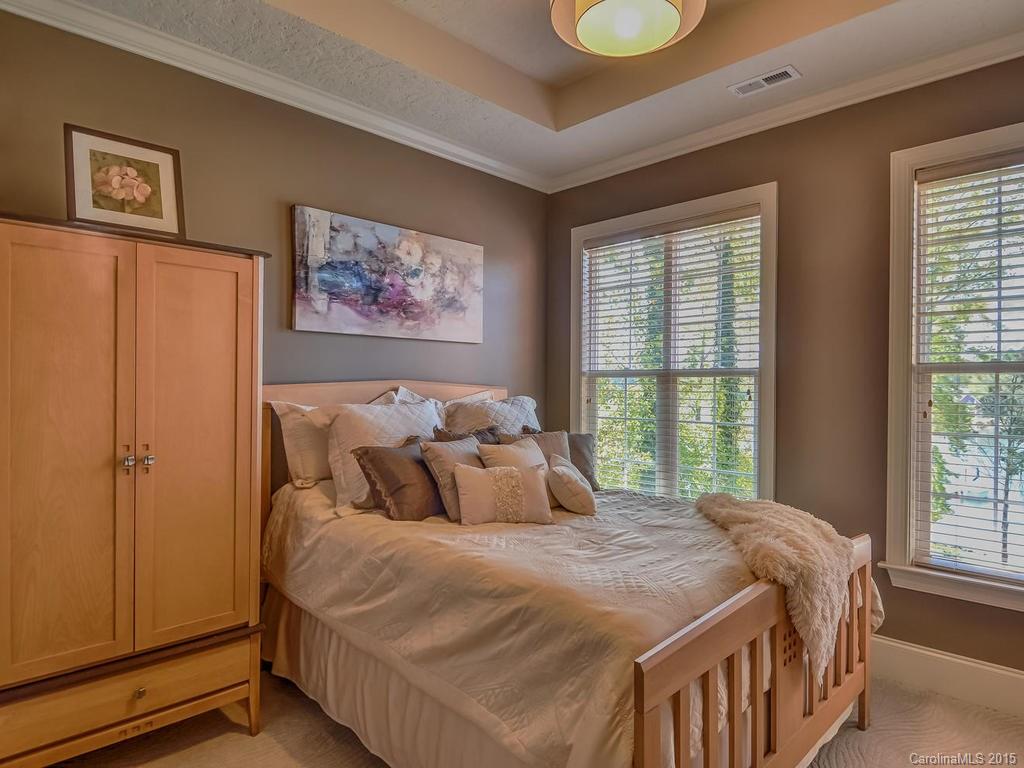 275 Whippoorwill Road Mooresville, NC 28117 - Photo 19 of 24 a bedroom with a bed and a window
