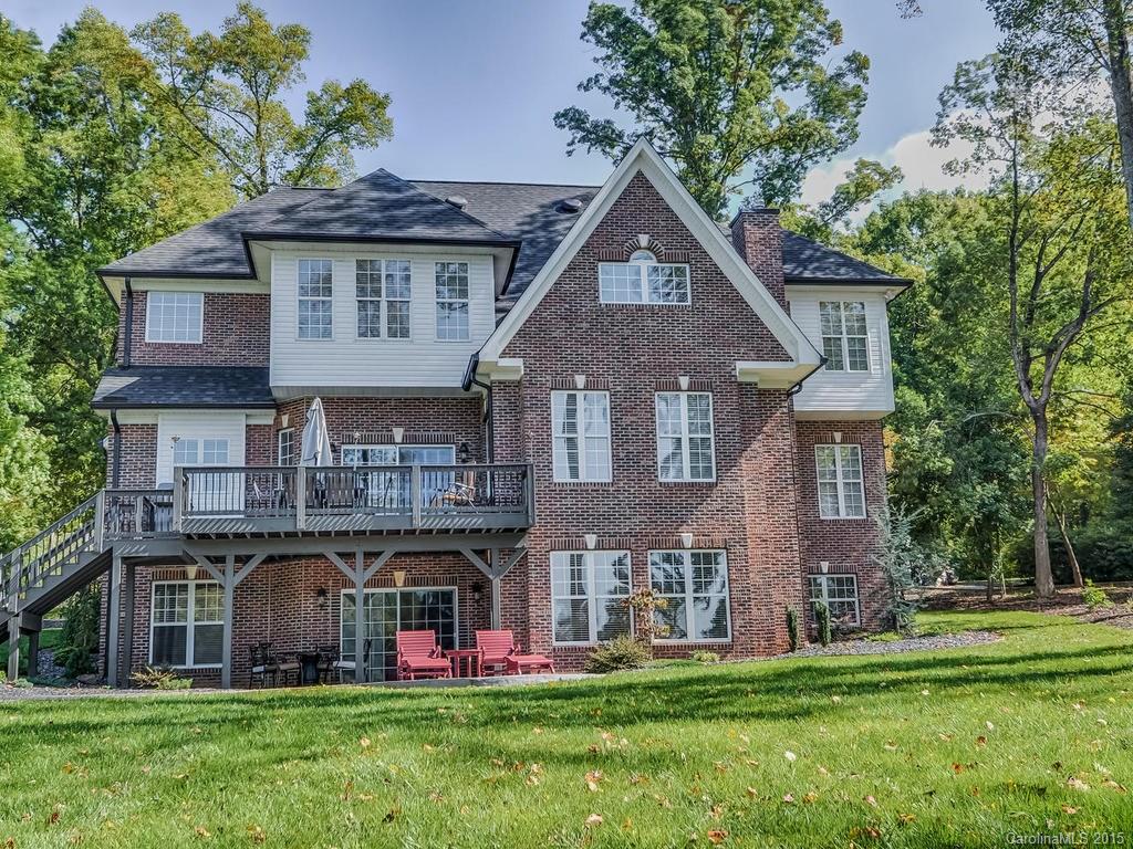 275 Whippoorwill Road Mooresville, NC 28117 - Photo 22 of 24 a front view of a house with a yard