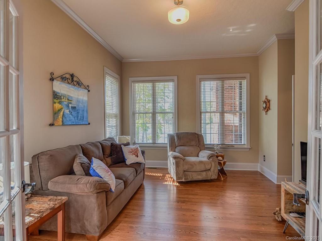 275 Whippoorwill Road Mooresville, NC 28117 - Photo 9 of 24 a living room with furniture and a large window