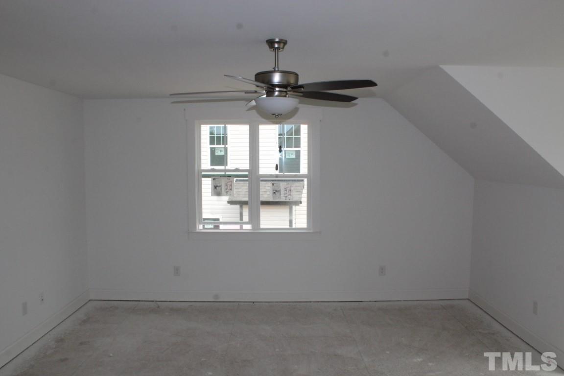 328 Prides Crossing Rolesville, NC 27571 - Photo 19 of 23 an empty room with a window