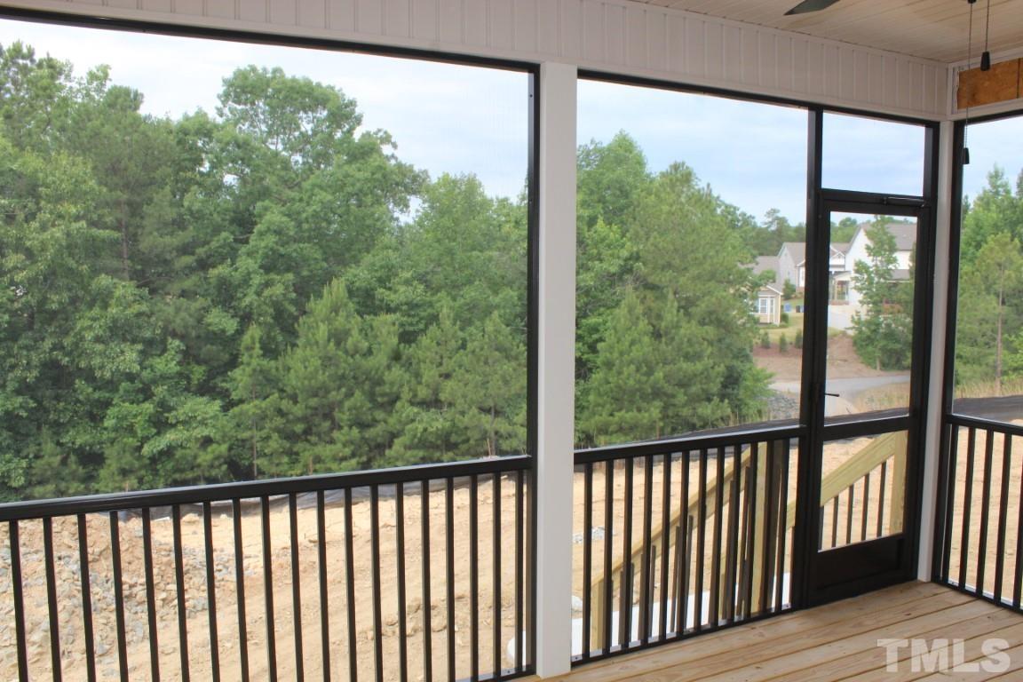 328 Prides Crossing Rolesville, NC 27571 - Photo 23 of 23 a view of a balcony with outdoor space