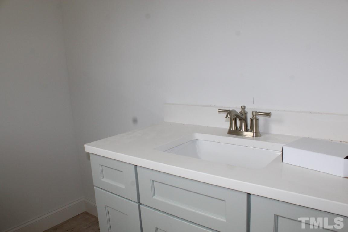328 Prides Crossing Rolesville, NC 27571 - Photo 10 of 23 a close view of sink and tap