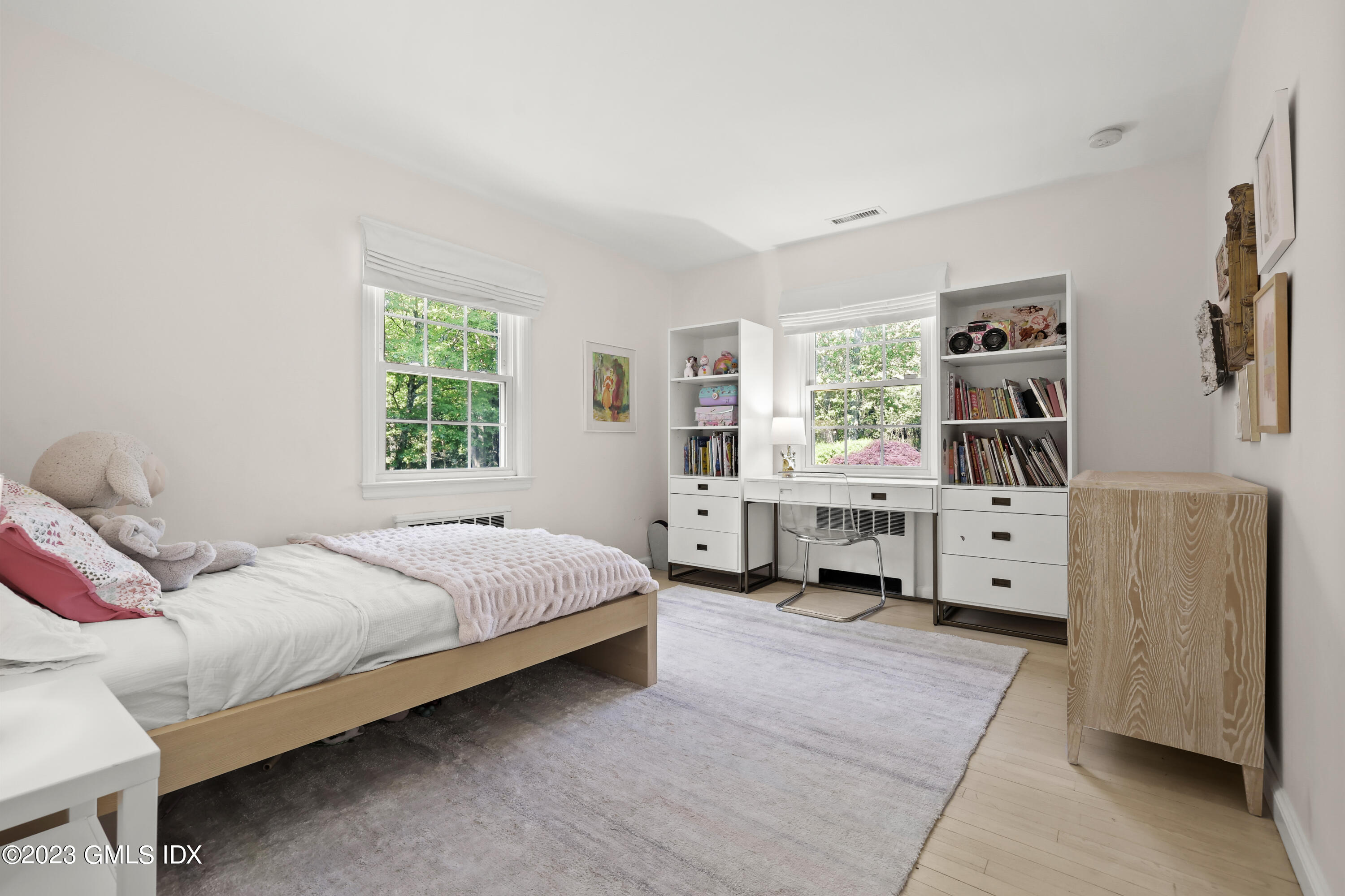 7 Cottontail Road Cos Cob, CT 06807 - Photo 19 of 29 a bedroom with a bed and a large window