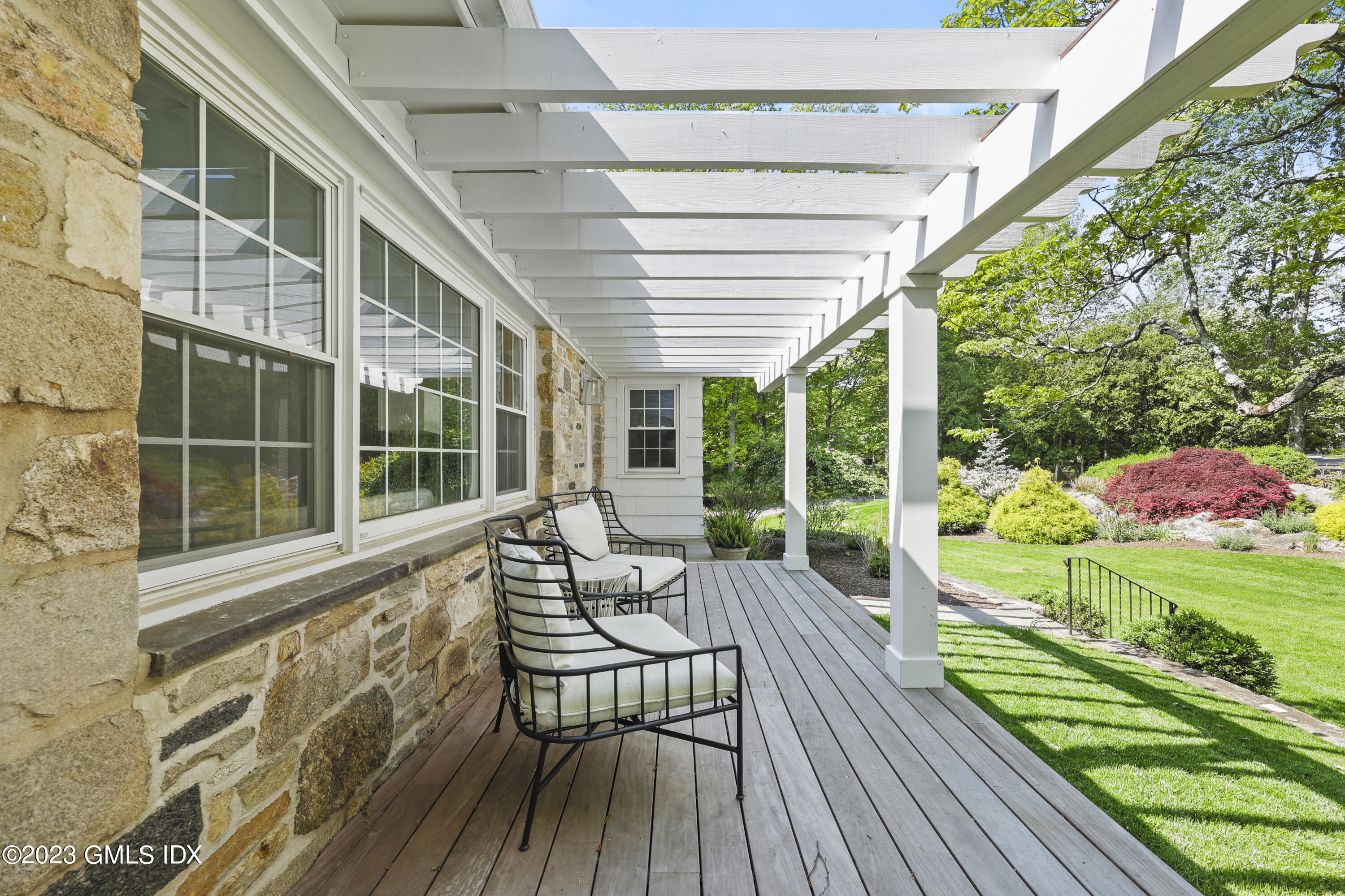 7 Cottontail Road Cos Cob, CT 06807 - Photo 2 of 29 a view of a house with backyard porch and sitting area