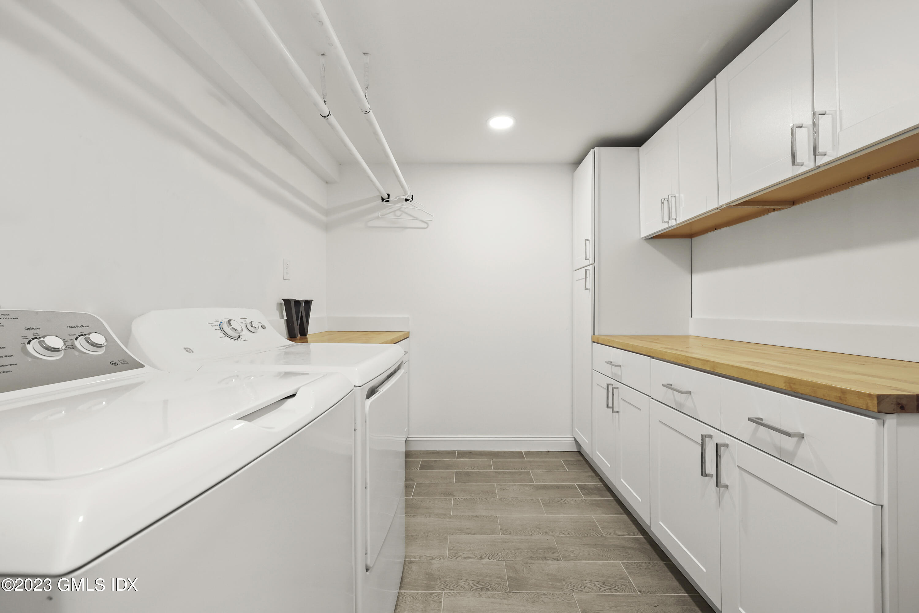 7 Cottontail Road Cos Cob, CT 06807 - Photo 23 of 29 a utility room with dryer and washer