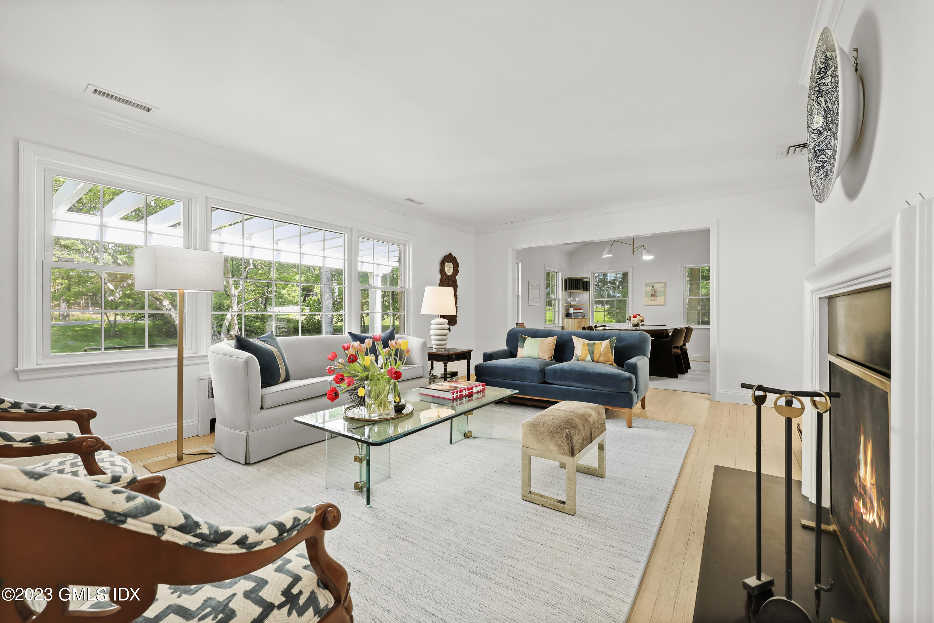 7 Cottontail Road Cos Cob, CT 06807 - Photo 4 of 29 a living room with furniture fireplace and large window