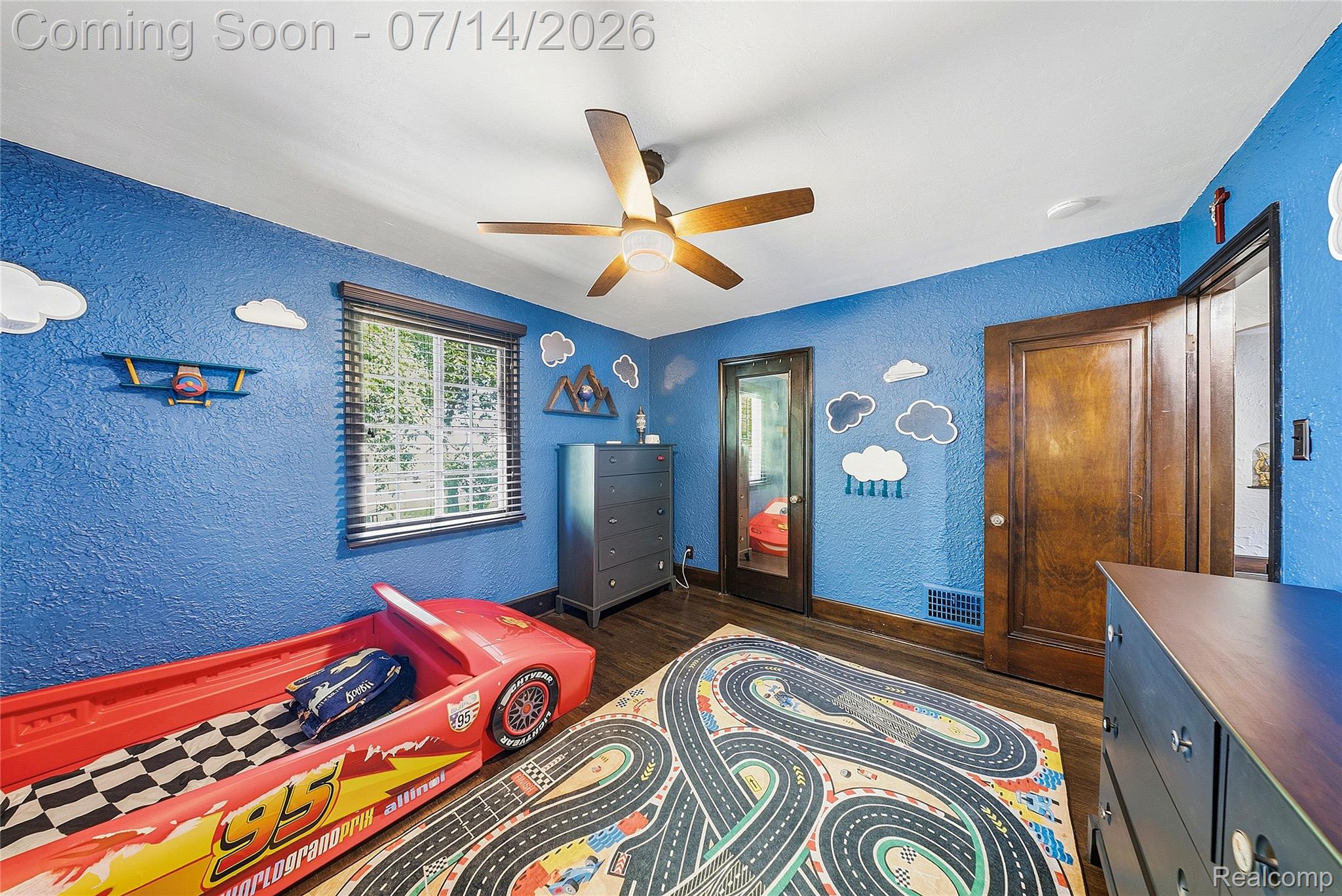 18460 Meridian Road Grosse Ile, MI 48138 - Photo 33 of 50 Room featuring wood-finish flooring, a window with blinds, and a ceiling fan