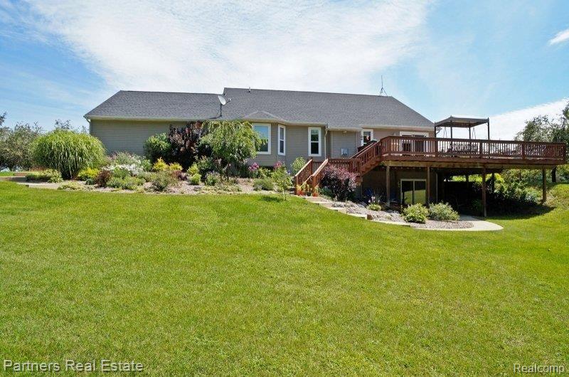10001 Oak Grove Road Howell, MI 48855 - Photo 22 of 25 Lush with Landscape.jpg