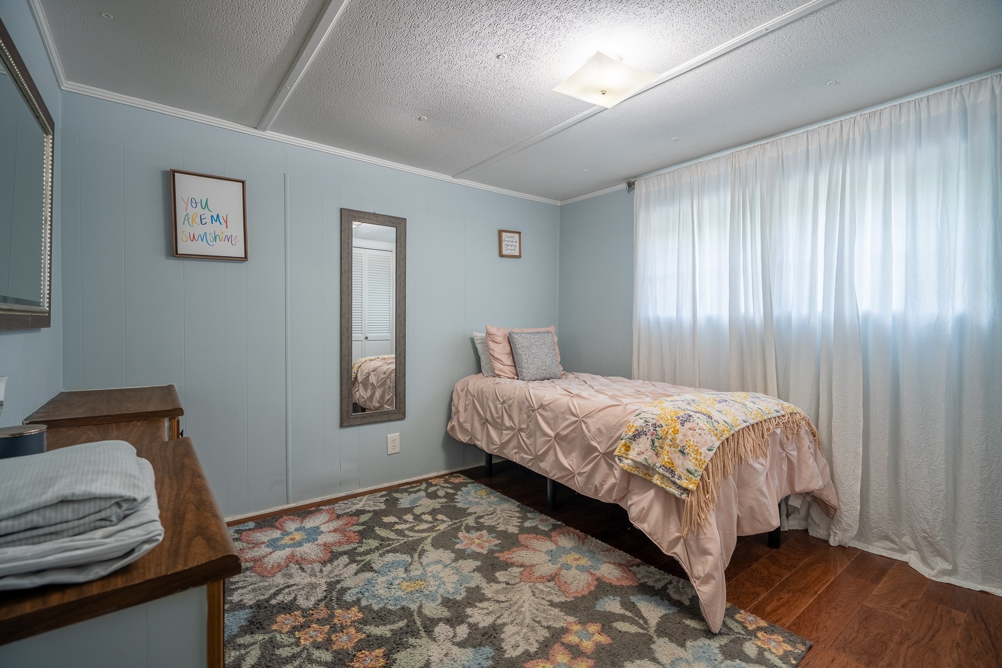 876 West Point Road Lawrenceburg, TN 38464 - Photo 26 of 42 a bedroom with a bed and window