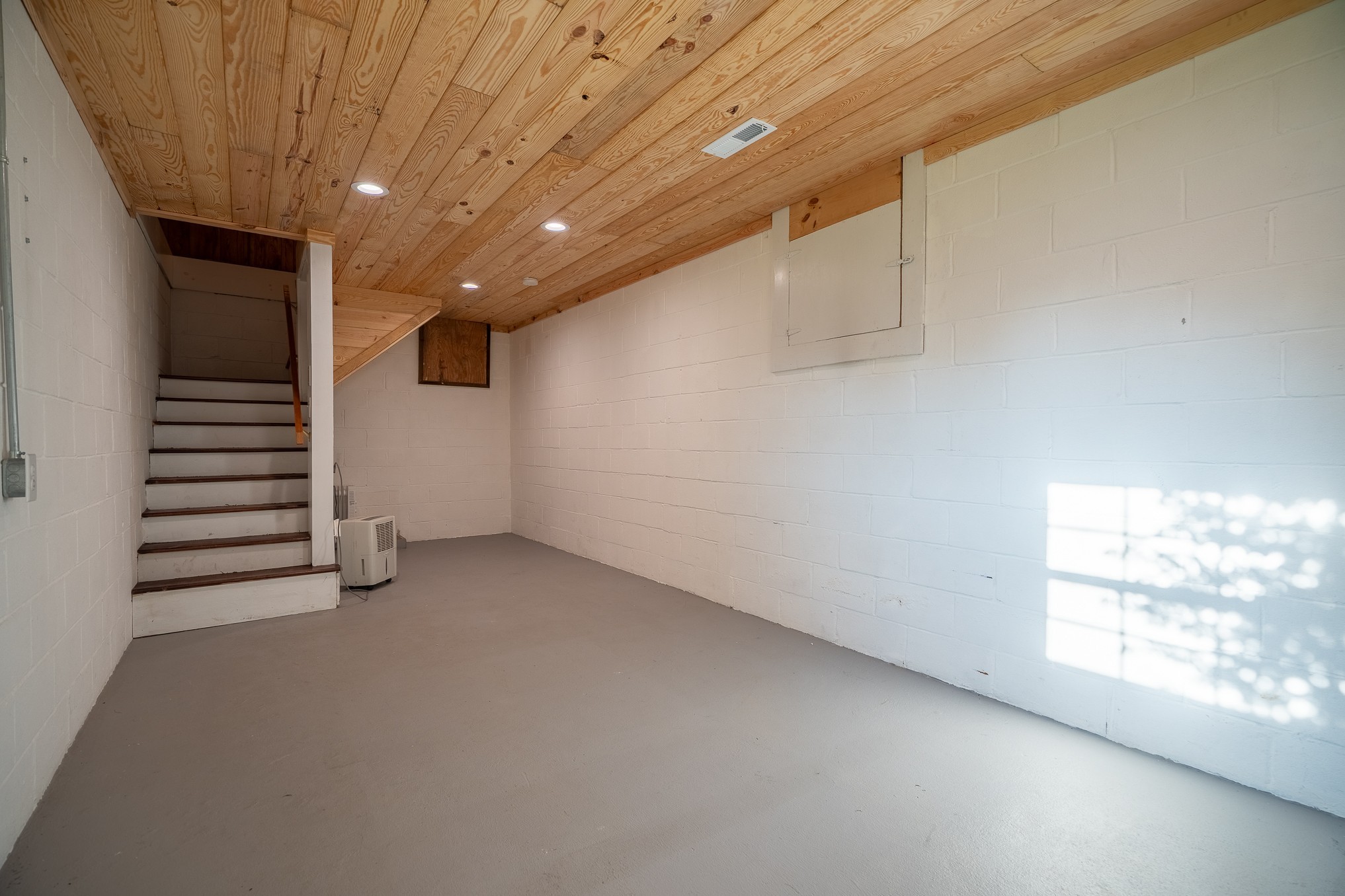 876 West Point Road Lawrenceburg, TN 38464 - Photo 27 of 42 wooden floor in an empty room with a window