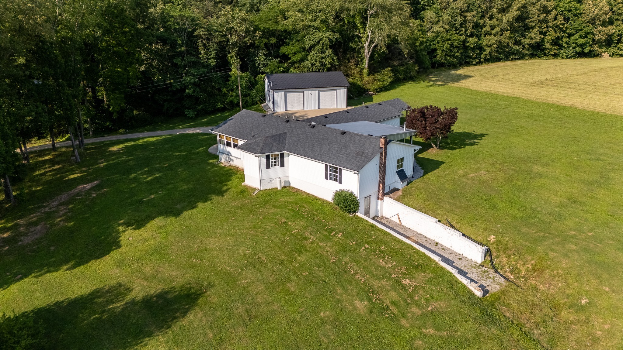 876 West Point Road Lawrenceburg, TN 38464 - Photo 34 of 42 a view of a house with a yard