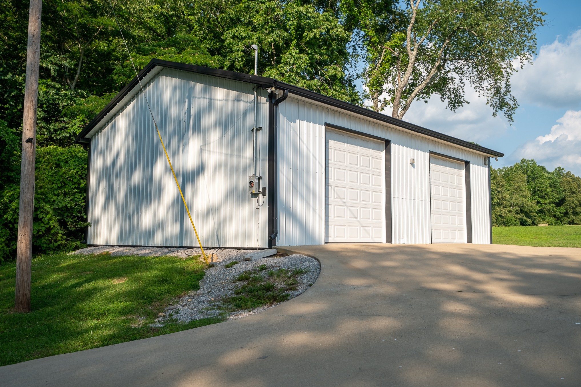 876 West Point Road Lawrenceburg, TN 38464 - Photo 5 of 42 a view of backyard with a garden and trees