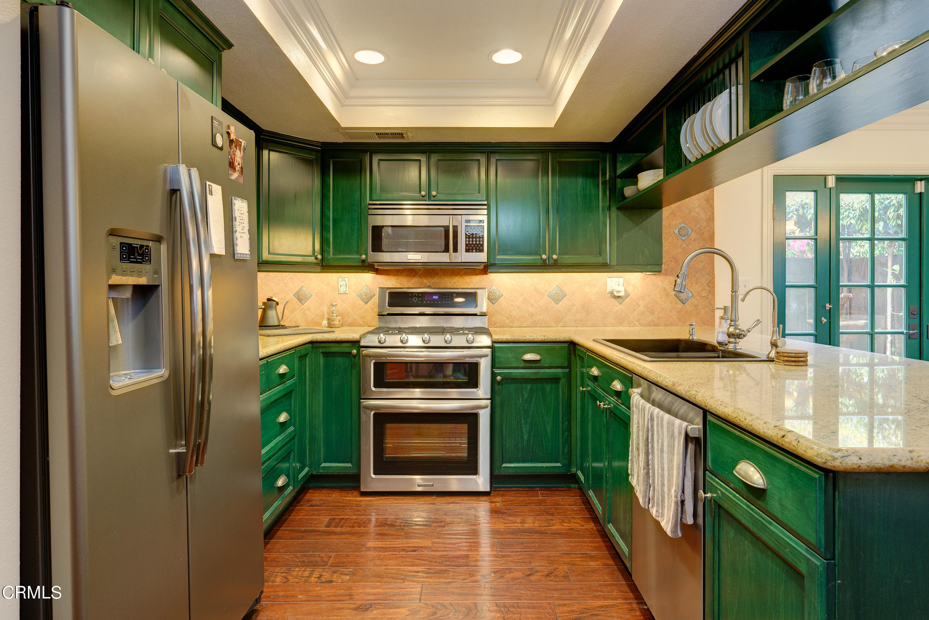1102 Calle Adra Duarte, CA 91010 - Photo 12 of 30 a kitchen with stainless steel appliances granite countertop a sink and a stove