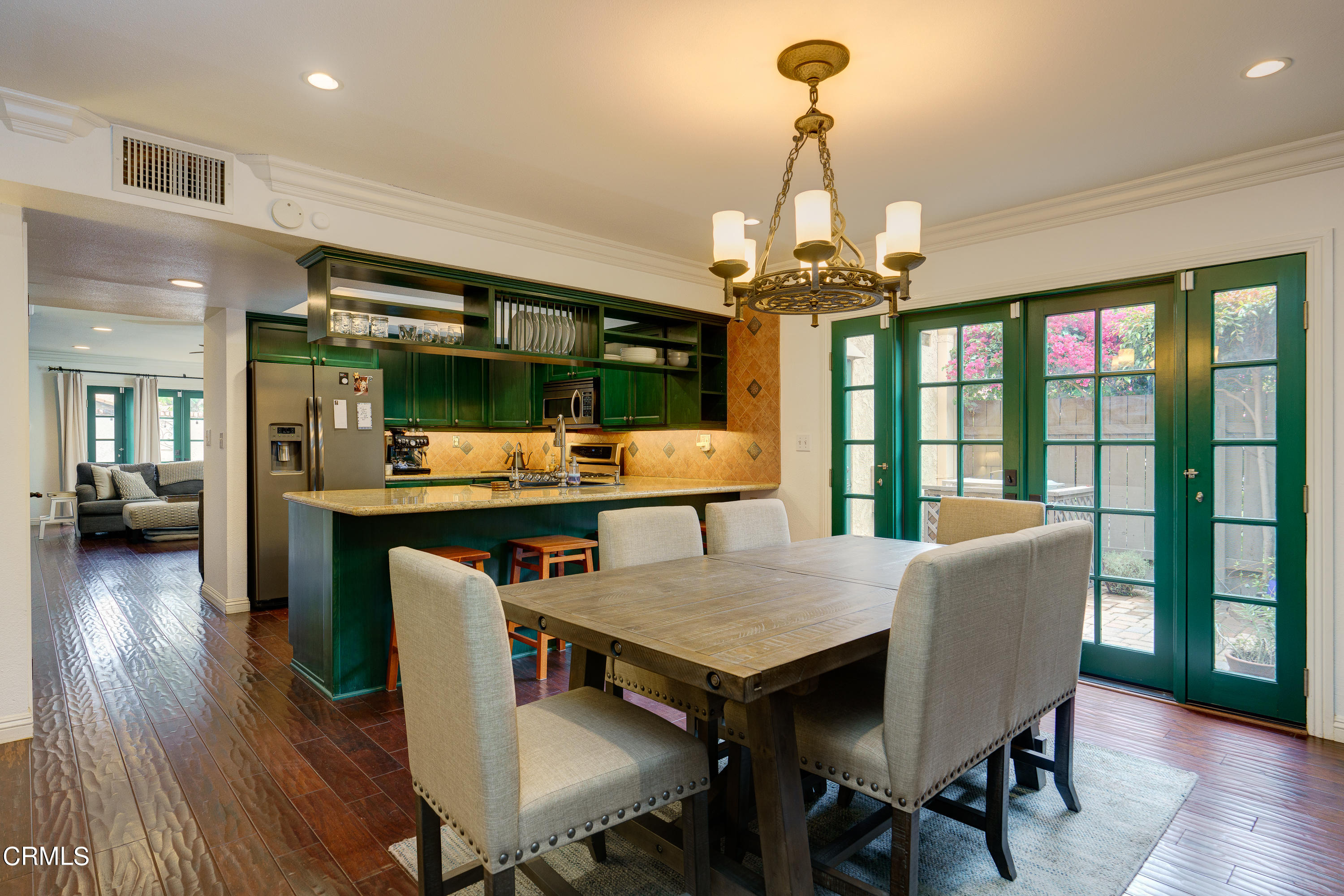 1102 Calle Adra Duarte, CA 91010 - Photo 15 of 30 a view of a dining room with furniture wooden floor and chandelier