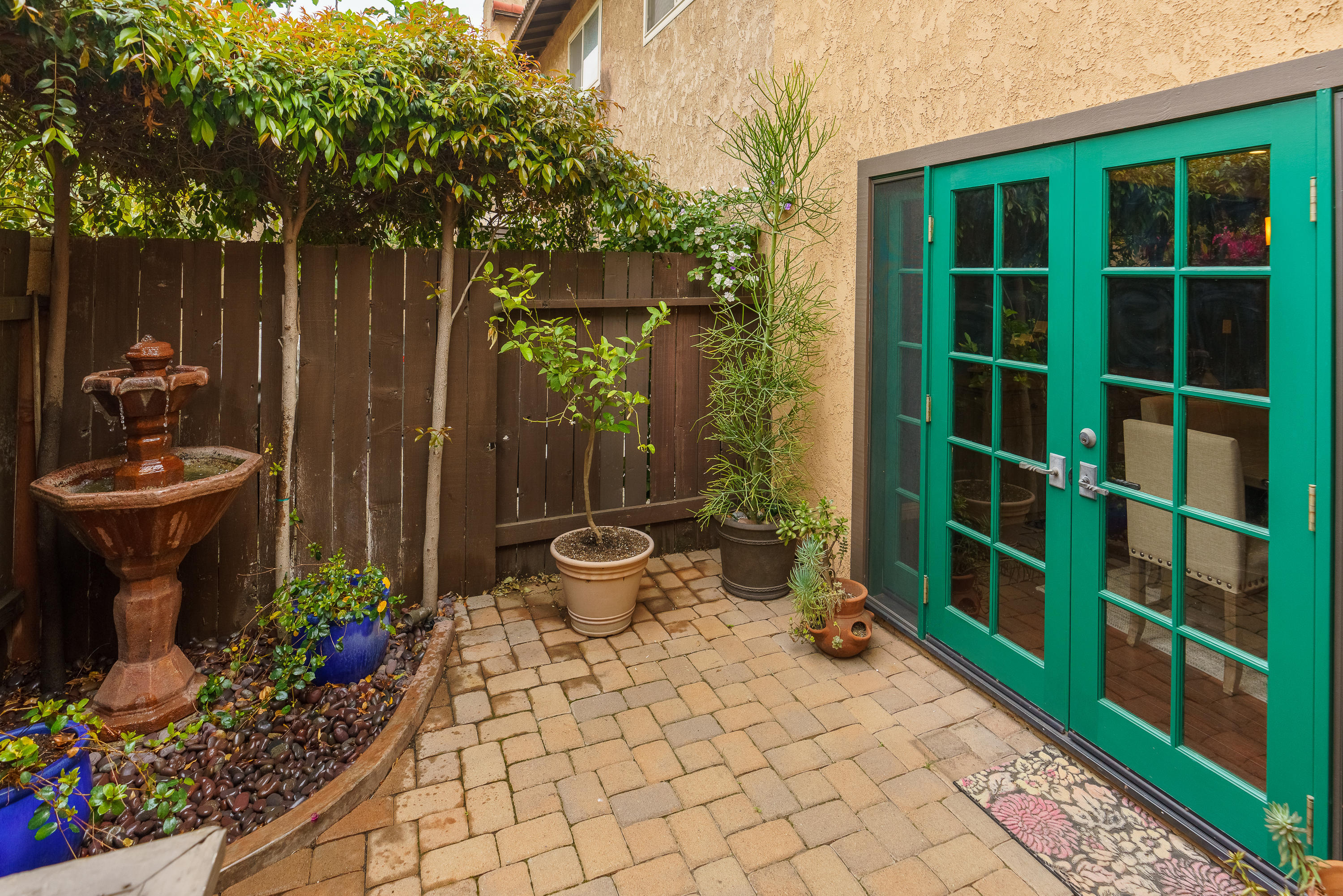 1102 Calle Adra Duarte, CA 91010 - Photo 19 of 30 a view of a balcony with chair and potted plants