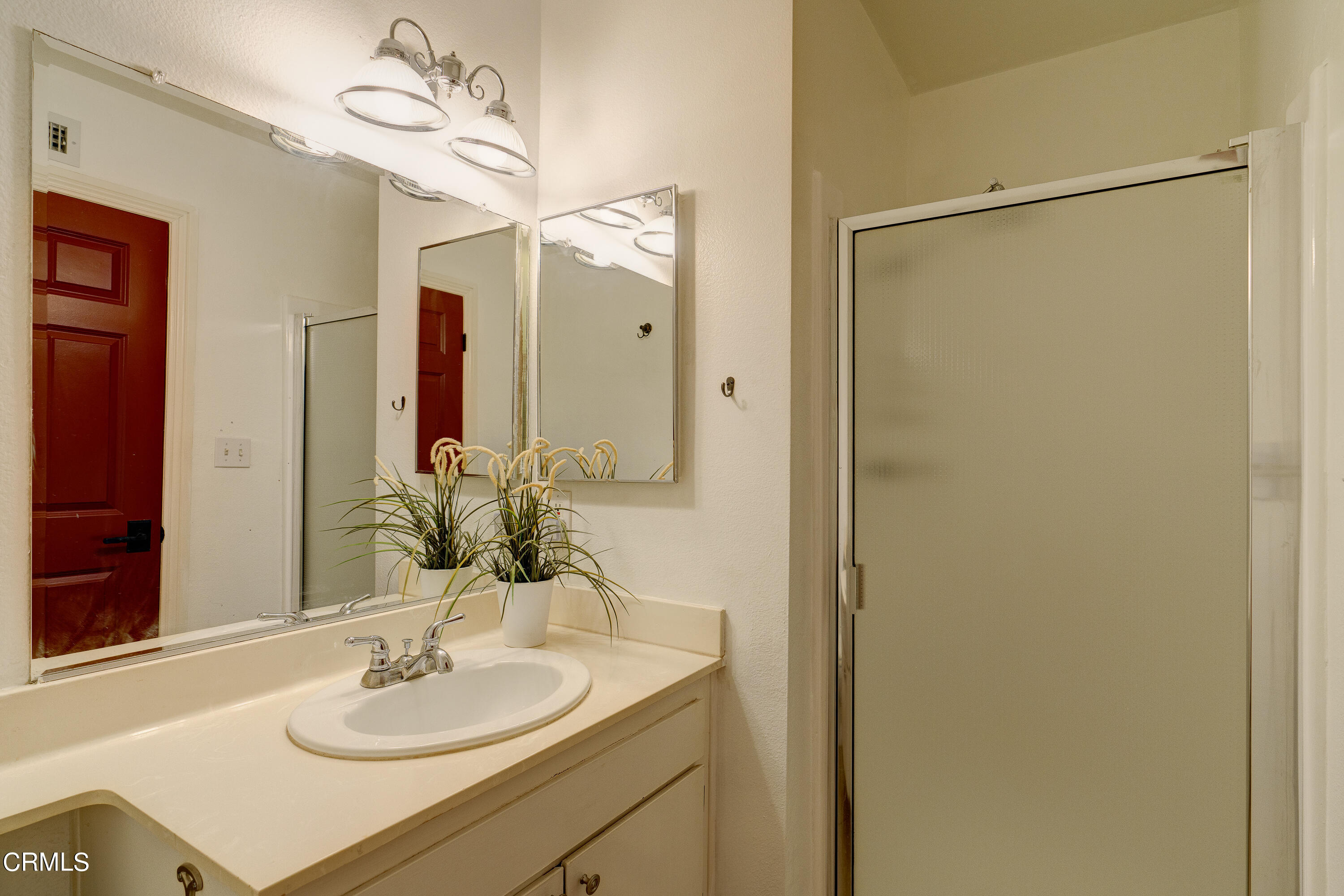 1102 Calle Adra Duarte, CA 91010 - Photo 24 of 30 a bathroom with a sink and a mirror