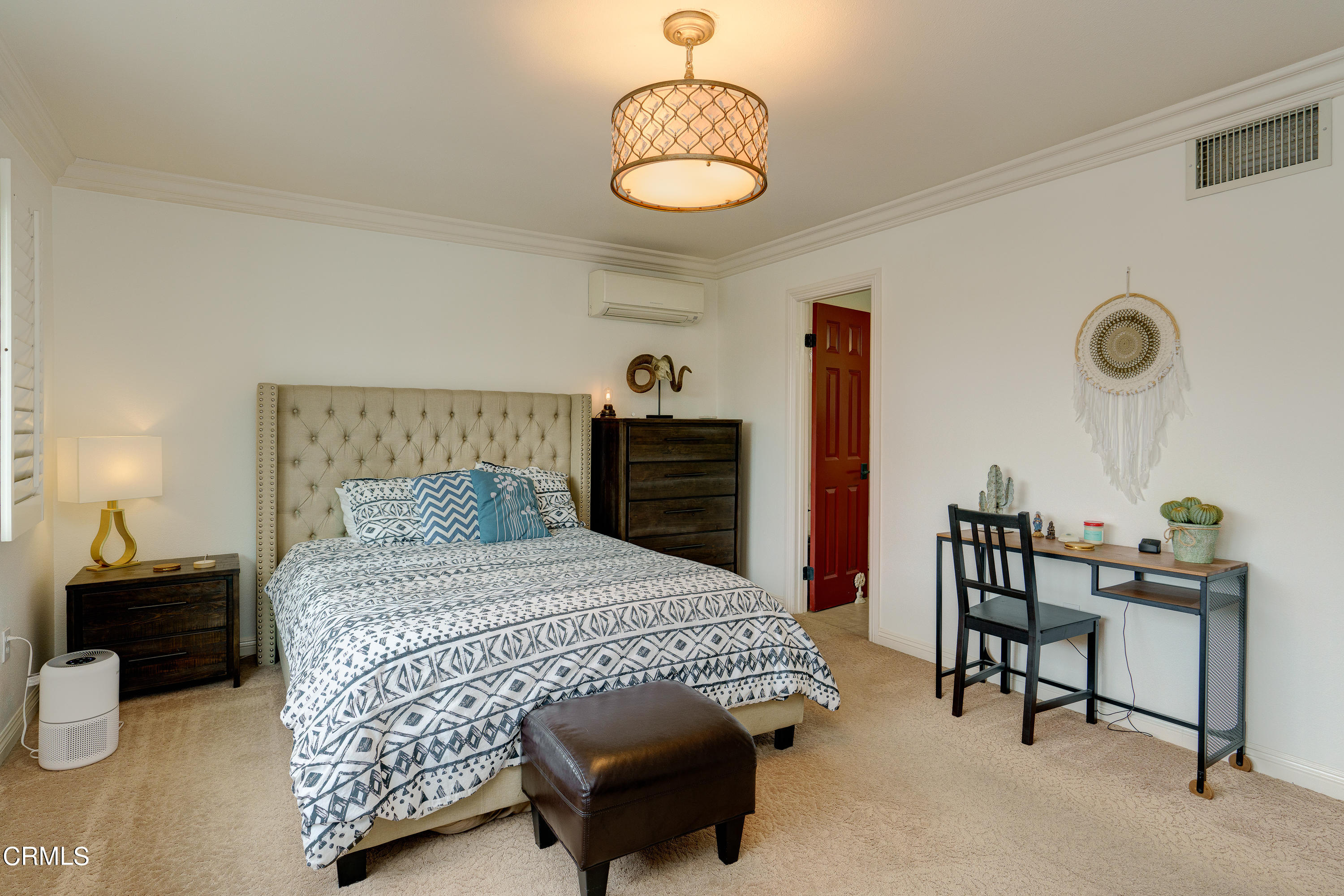 1102 Calle Adra Duarte, CA 91010 - Photo 26 of 30 a bedroom with a bed and a chandelier