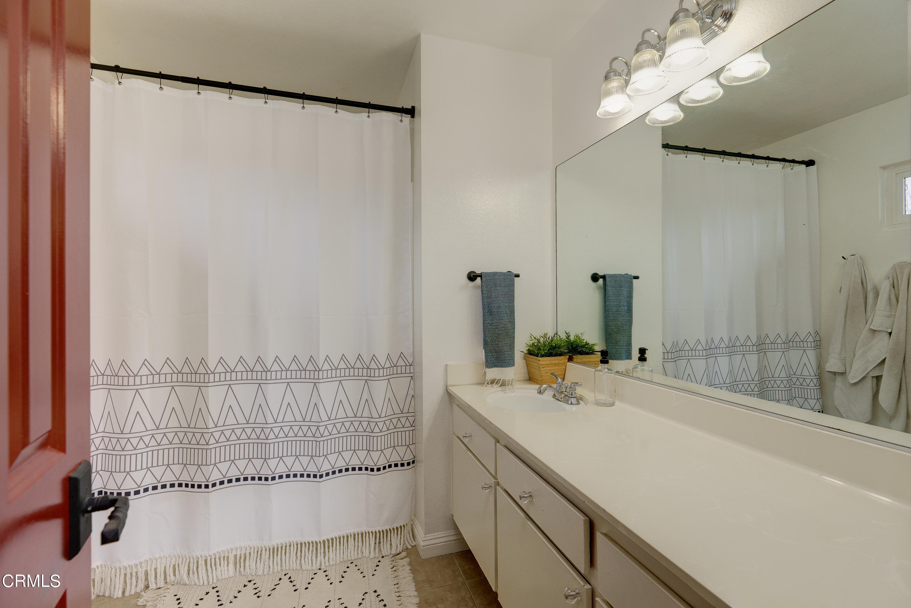 1102 Calle Adra Duarte, CA 91010 - Photo 28 of 30 a bathroom with a double vanity sink and a shower