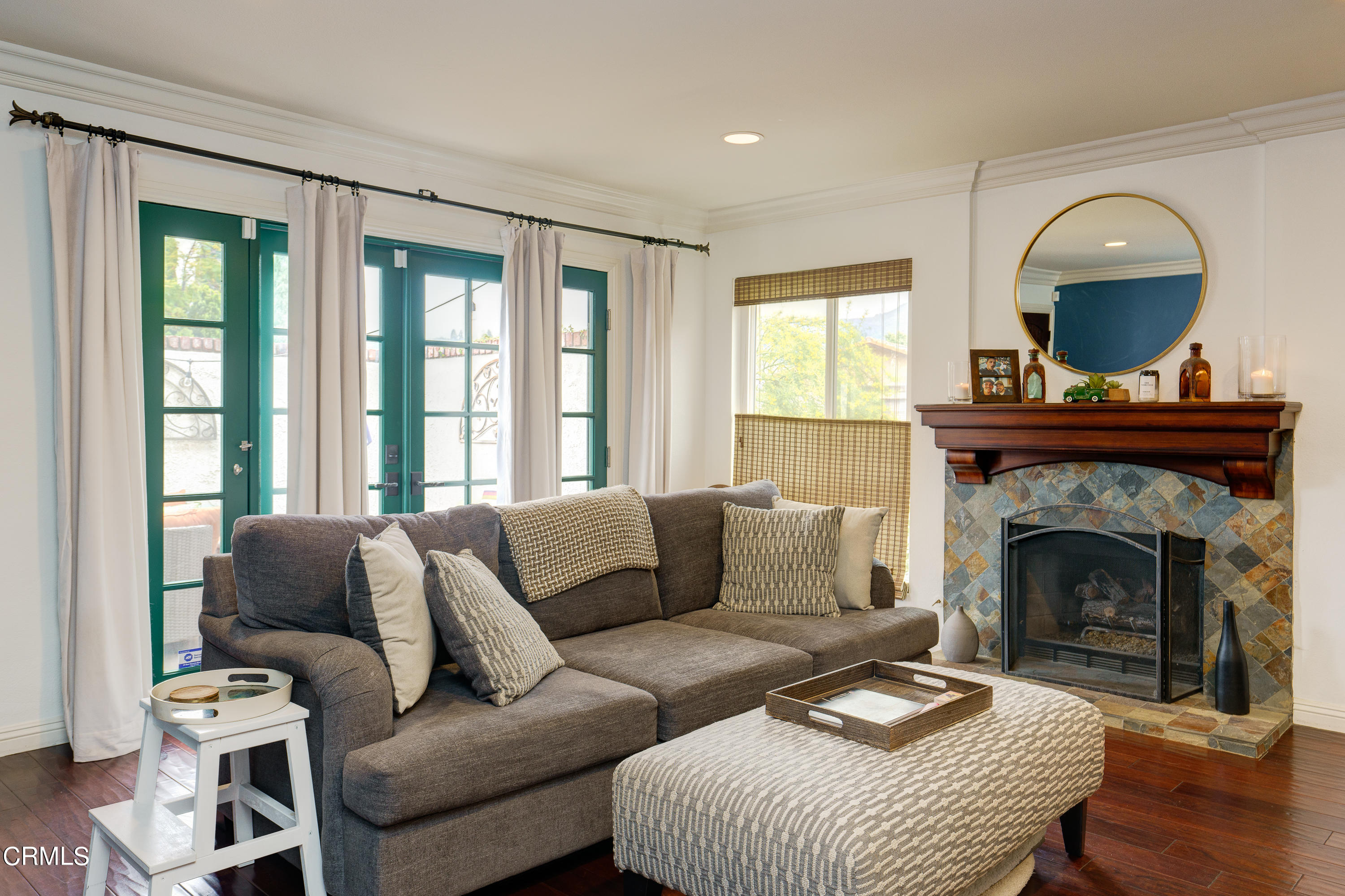 1102 Calle Adra Duarte, CA 91010 - Photo 7 of 30 a living room with furniture a fireplace and a floor to ceiling window