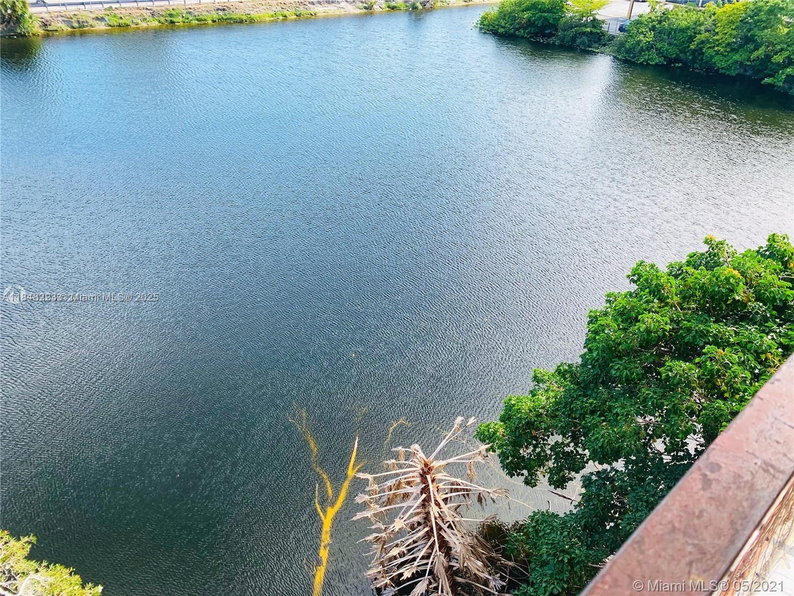 a view of a lake with an outdoor space