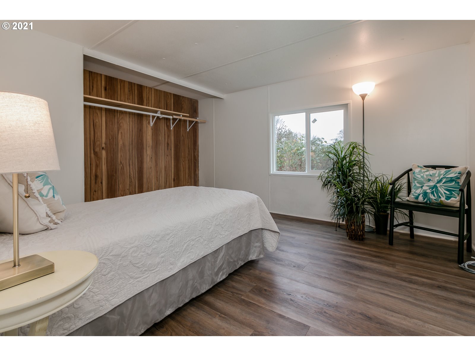 7080 Thurston Road, Unit SP 12 Springfield, OR 97478 - Photo 14 of 22 a bedroom with a bed window and a table