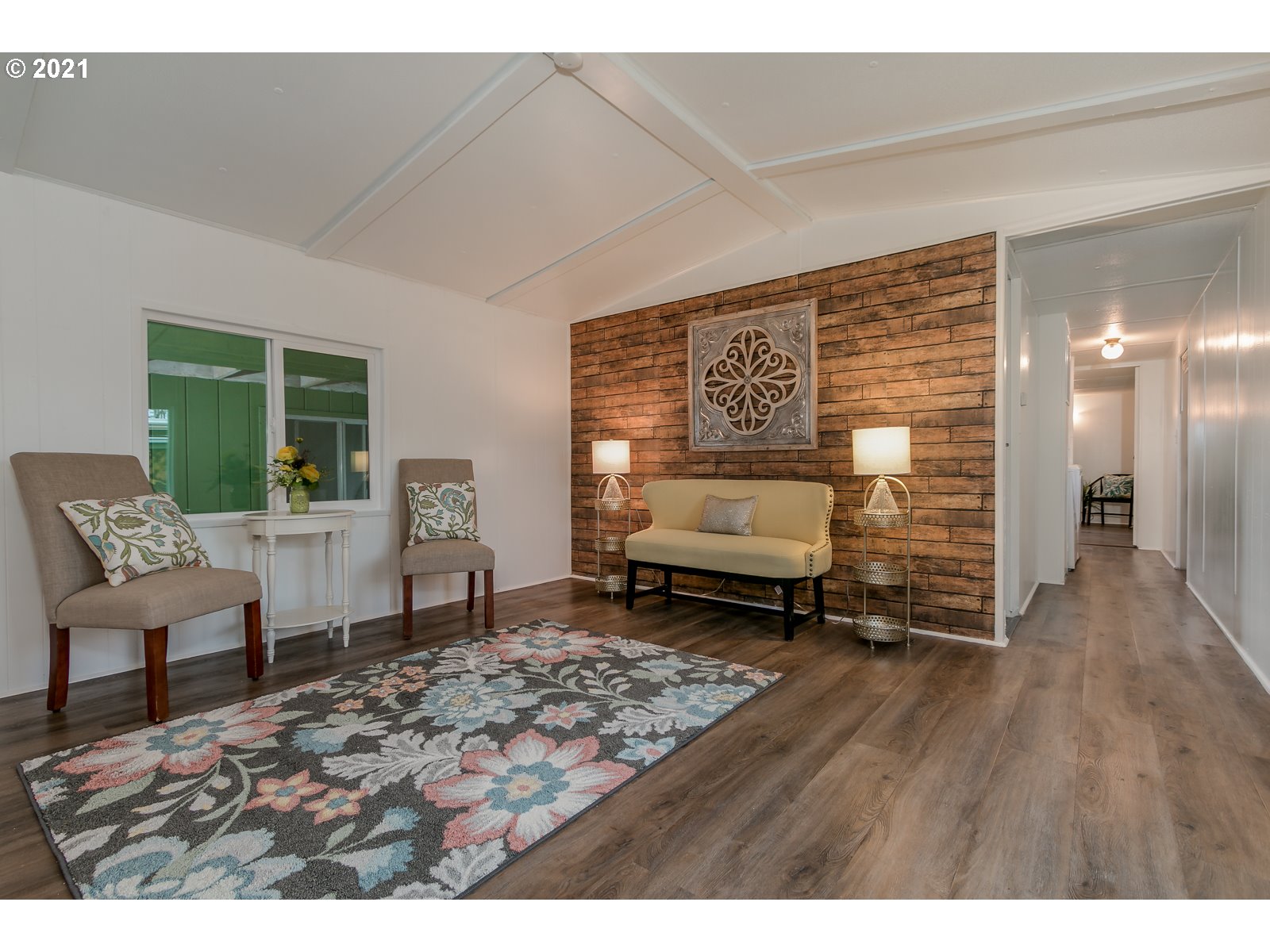 7080 Thurston Road, Unit SP 12 Springfield, OR 97478 - Photo 5 of 22 a view of a livingroom with furniture and windows