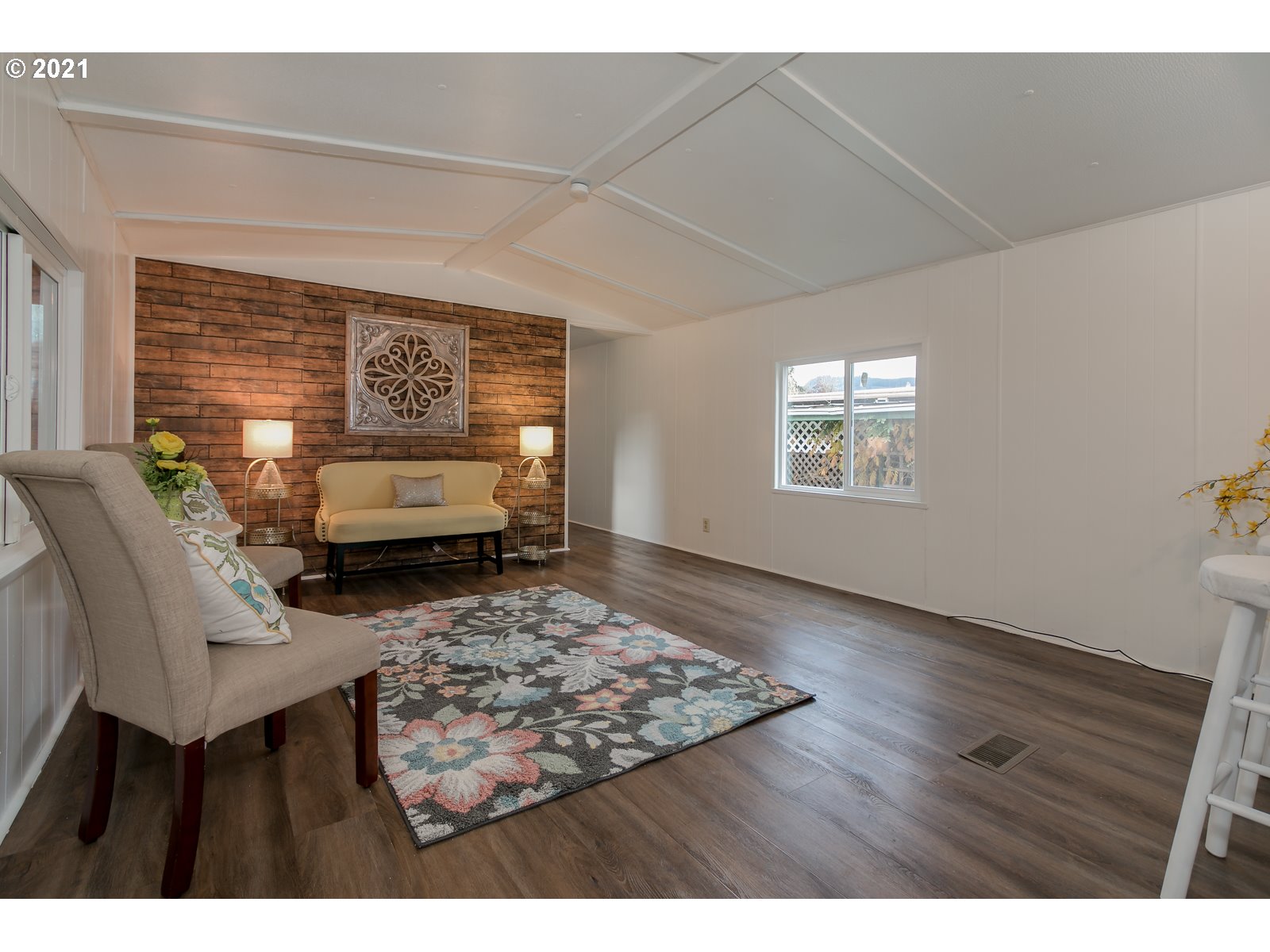 7080 Thurston Road, Unit SP 12 Springfield, OR 97478 - Photo 7 of 22 a living room with furniture and a window