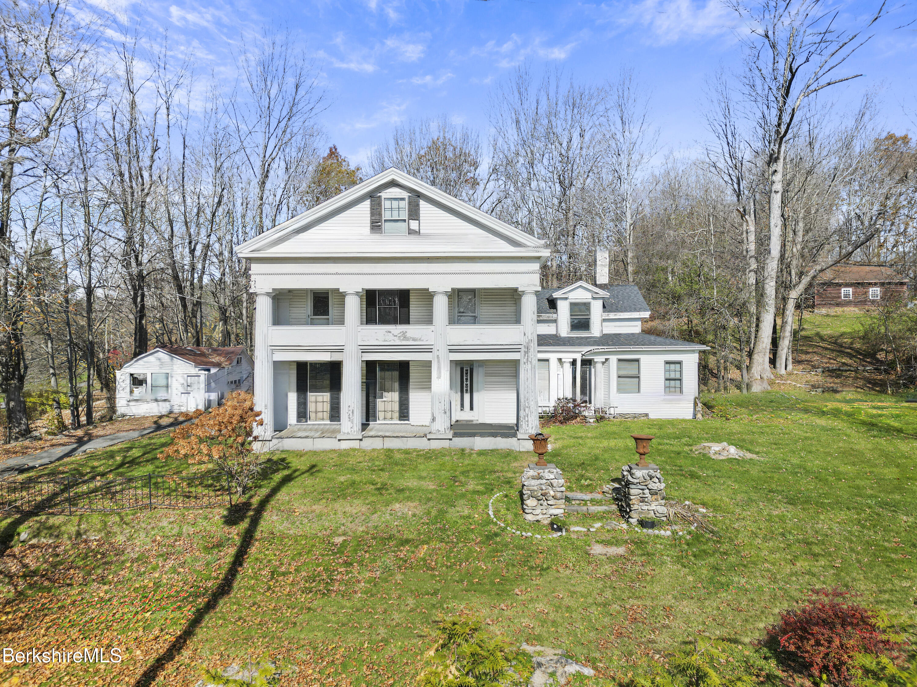 469 Maple Street Hinsdale, MA 01235 - Photo 4 of 14 a front view of a house with garden