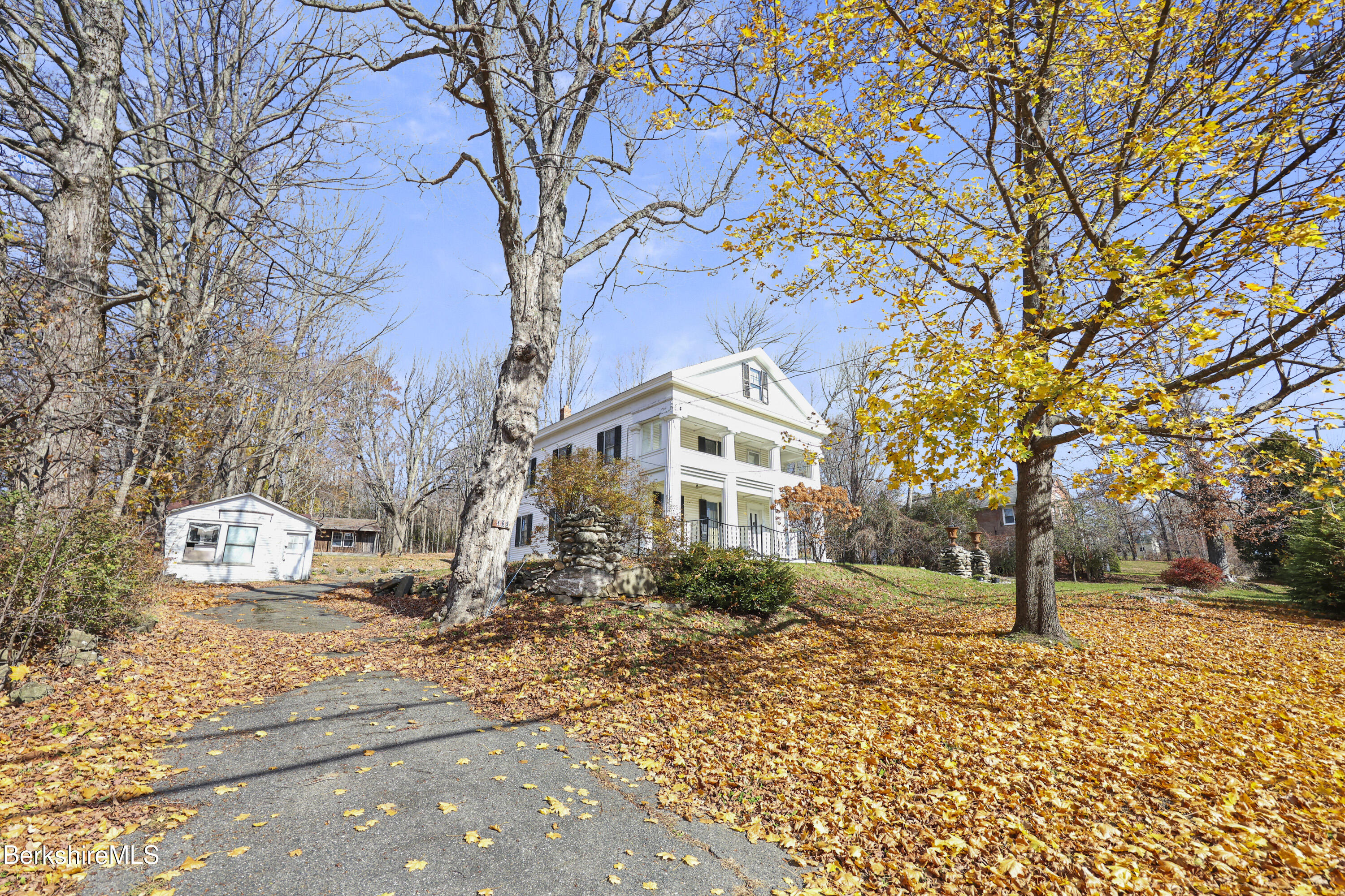 469 Maple Street Hinsdale, MA 01235 - Photo 5 of 14 a front view of a house with a yard