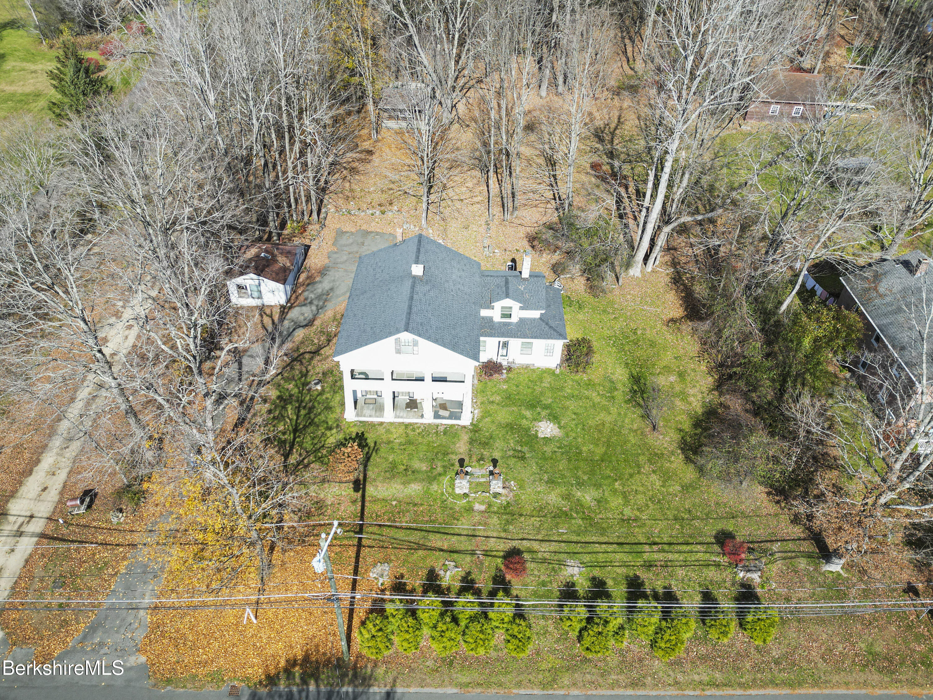469 Maple Street Hinsdale, MA 01235 - Photo 7 of 14 a view of a big yard with potted plants and large tree