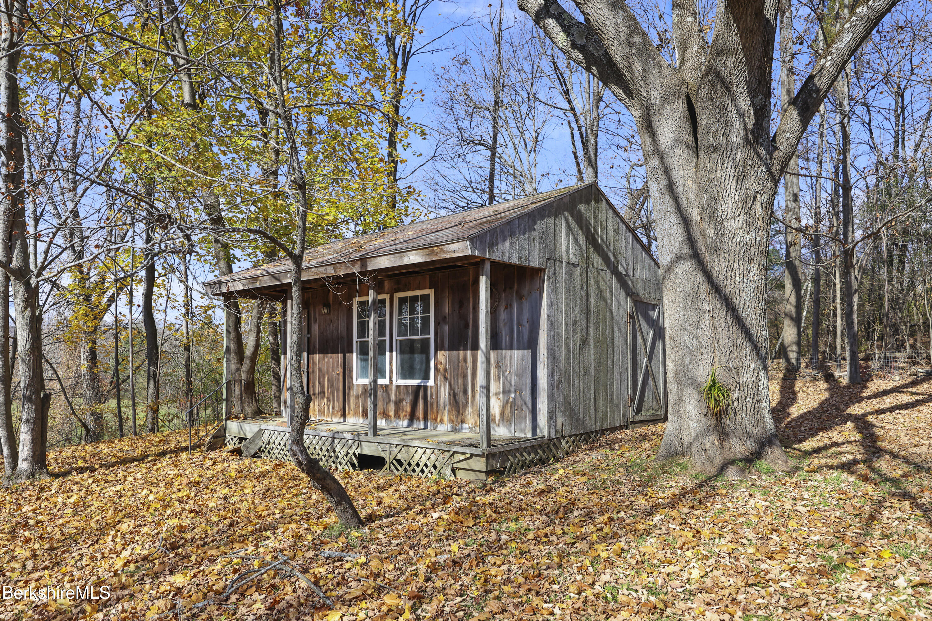 469 Maple Street Hinsdale, MA 01235 - Photo 10 of 14 a house with trees in front of it