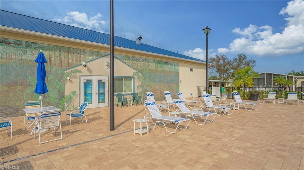 161 Tarpon Punta Gorda, FL 33950 - Photo 13 of 14 a view of a patio with a table and chairs