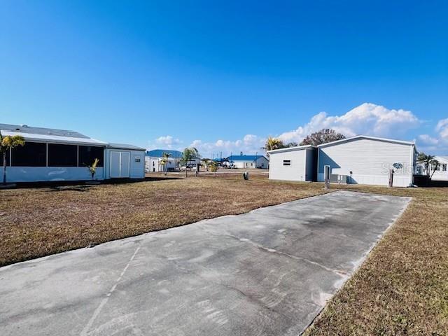 161 Tarpon Punta Gorda, FL 33950 - Photo 2 of 14 a view of a house with a yard