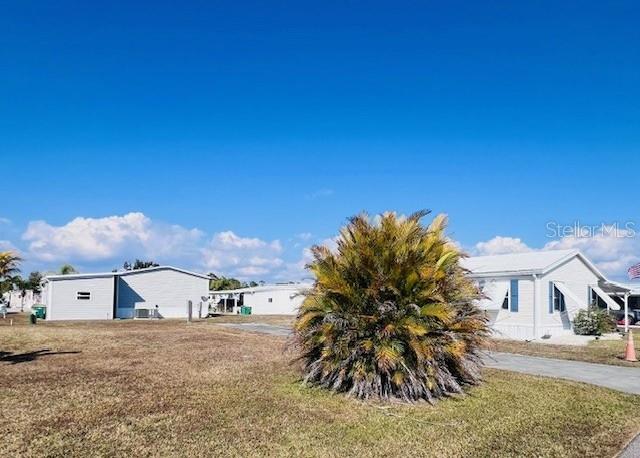 161 Tarpon Punta Gorda, FL 33950 - Photo 3 of 14 a view of a house with a yard
