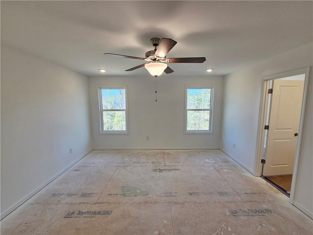 120 Silverleaf Trail Bethlehem, GA 30620 - Photo 15 of 45 a view of an empty room with a window