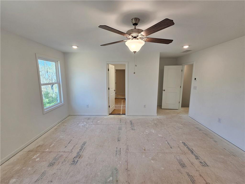 120 Silverleaf Trail Bethlehem, GA 30620 - Photo 16 of 45 a view of an empty room with a window