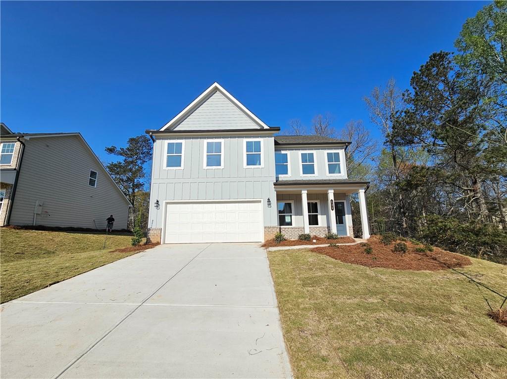 120 Silverleaf Trail Bethlehem, GA 30620 - Photo 2 of 45 a front view of a house with a yard