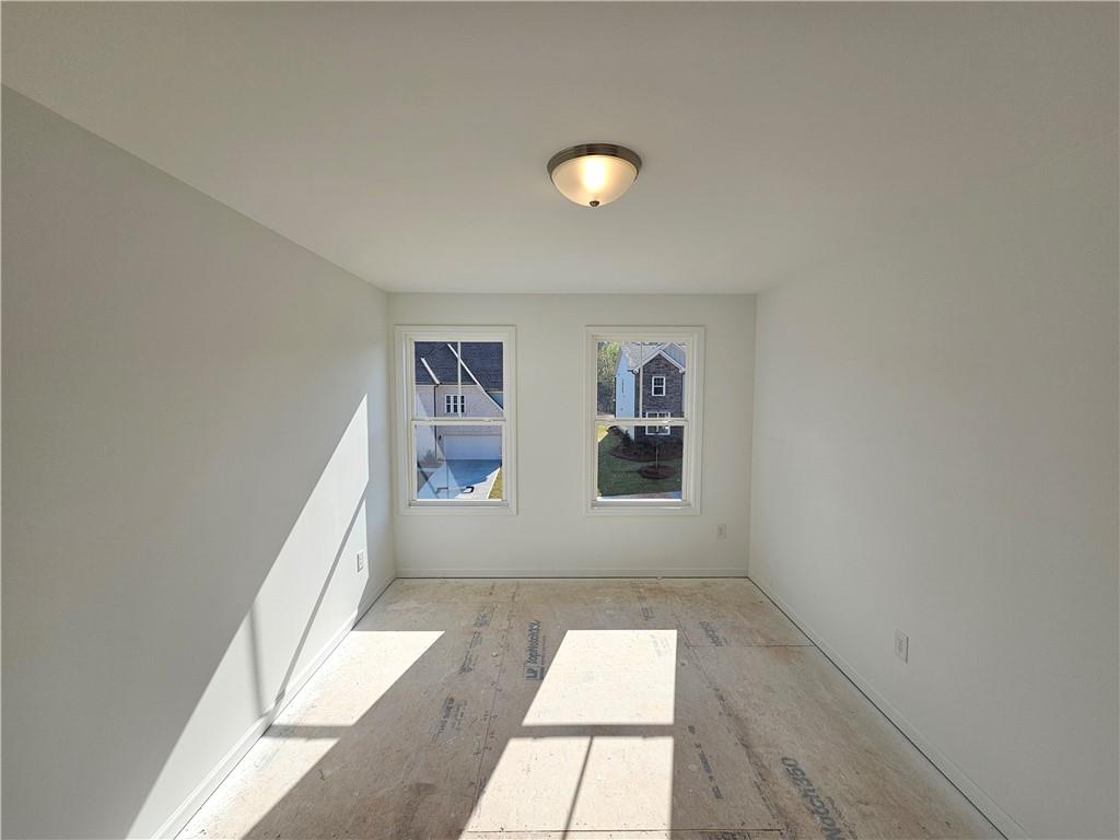 120 Silverleaf Trail Bethlehem, GA 30620 - Photo 21 of 45 a view of an empty room with a window