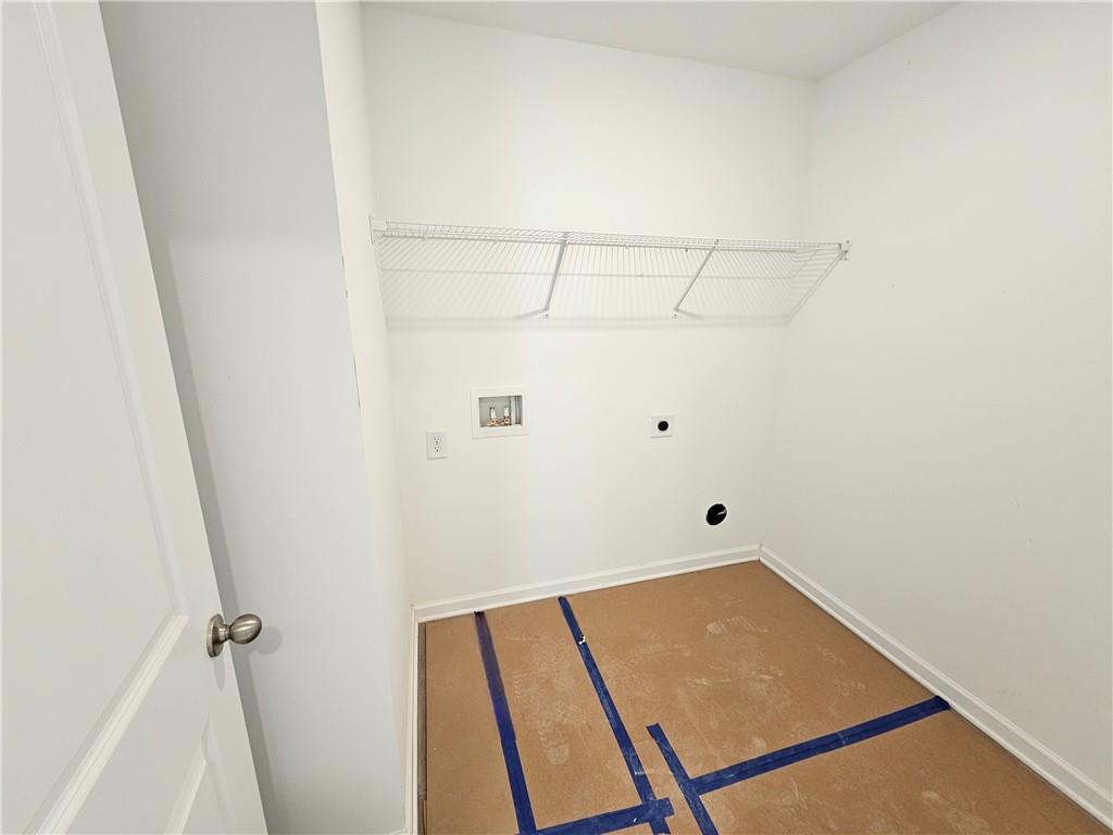 120 Silverleaf Trail Bethlehem, GA 30620 - Photo 28 of 45 a view of a room with racks on the wall