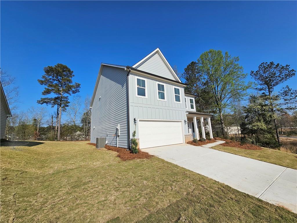 120 Silverleaf Trail Bethlehem, GA 30620 - Photo 3 of 45 a view of a house with a yard and potted plants
